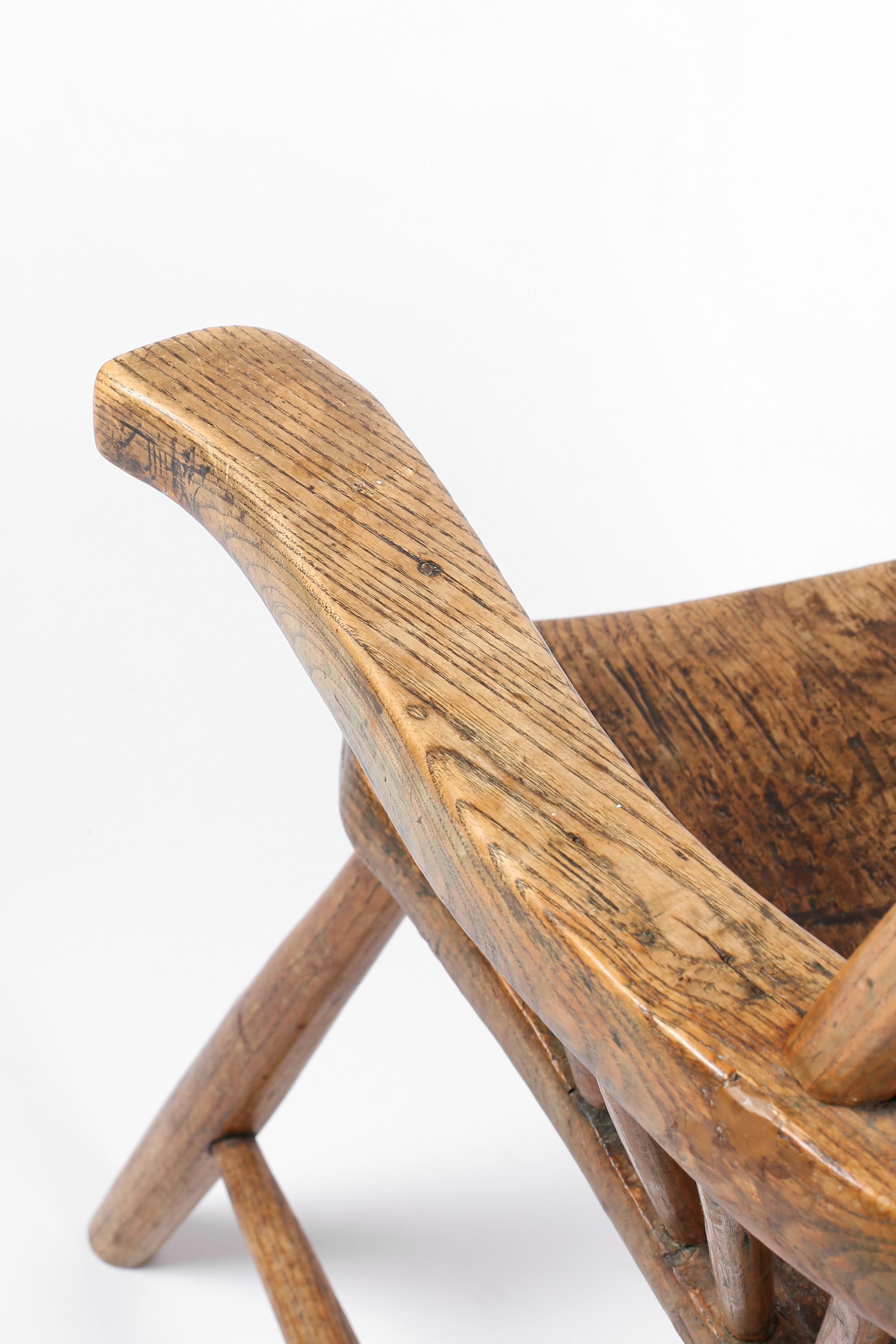 Silla Windsor con respaldo de varilla primitiva de principios del siglo XIX en venta 10