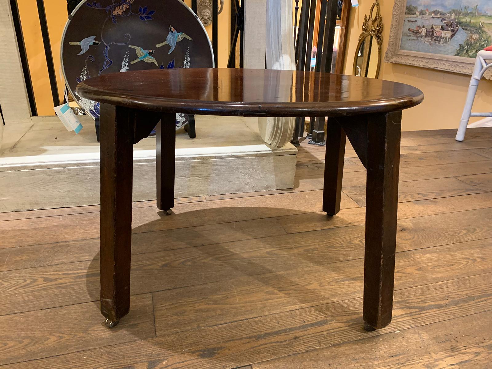 Early 19th century provincial English oval coffee table.