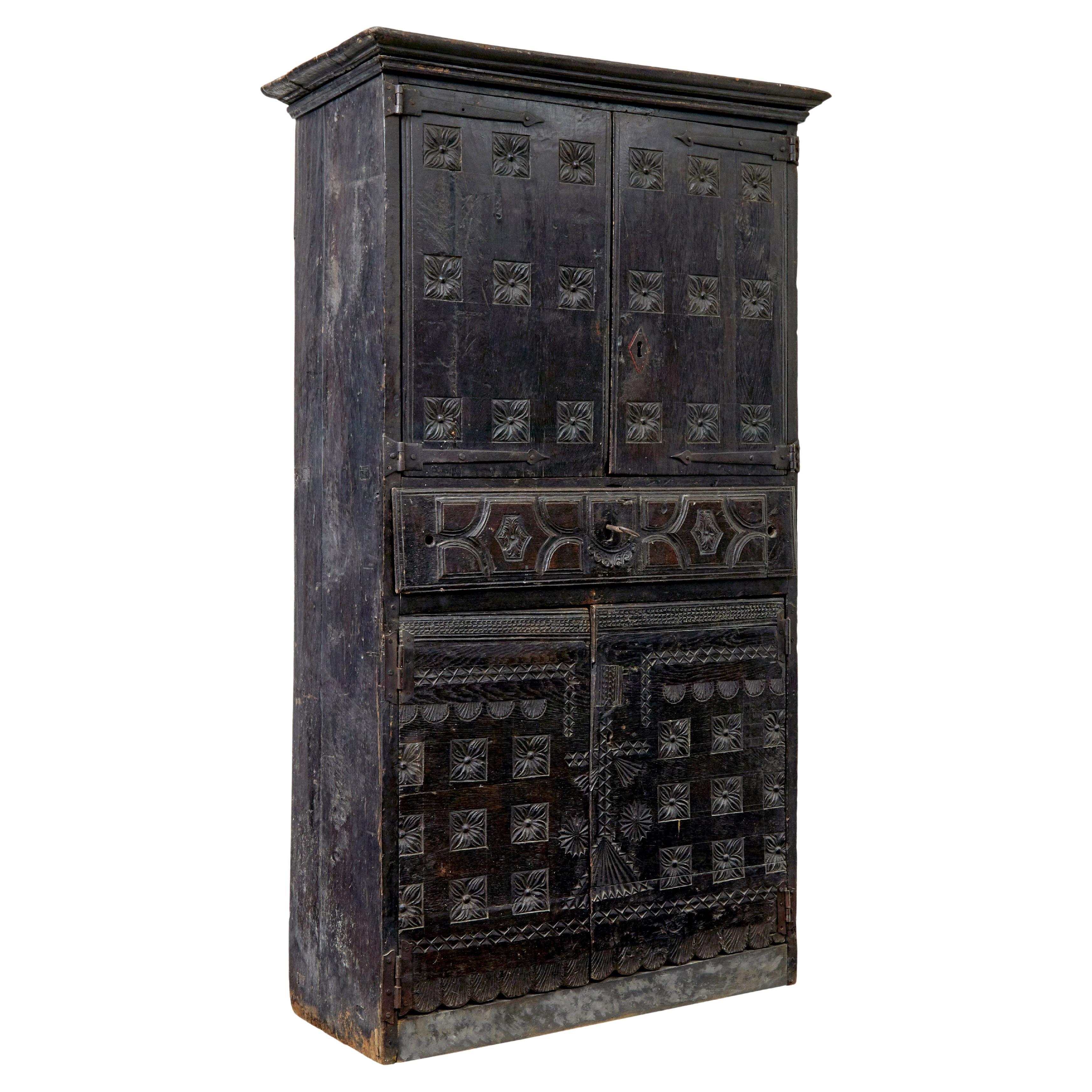 Early 19th century Pyrenean folk art oak and chestnut carved cupboard For Sale