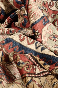 Early 19th Century, Red Field, Ivory, Blue and Green, Caucasian Sevan Kazak Rug