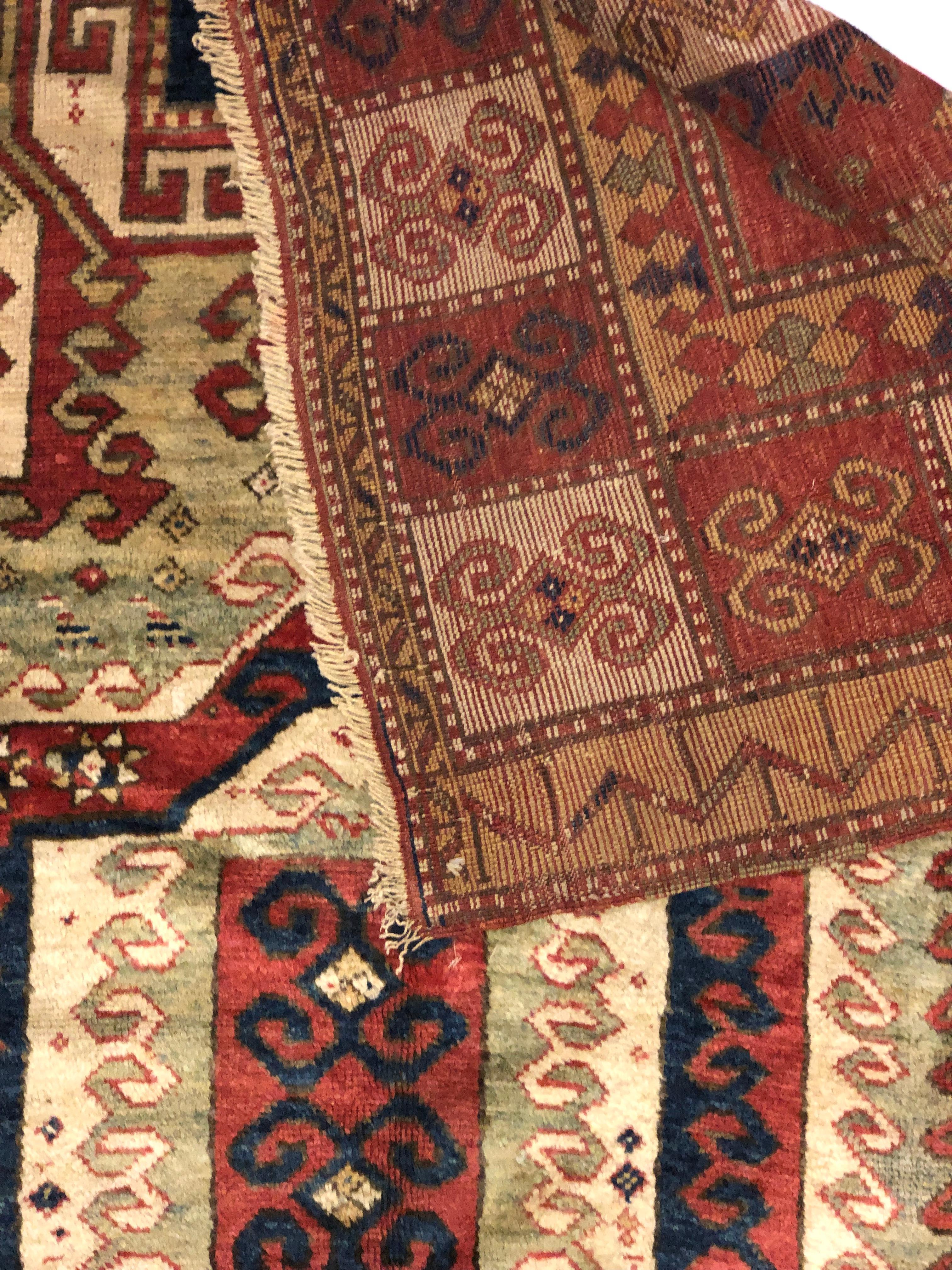Armenian Early 19th Century, Red Field, Ivory, Blue and Green, Caucasian Sevan Kazak Rug For Sale