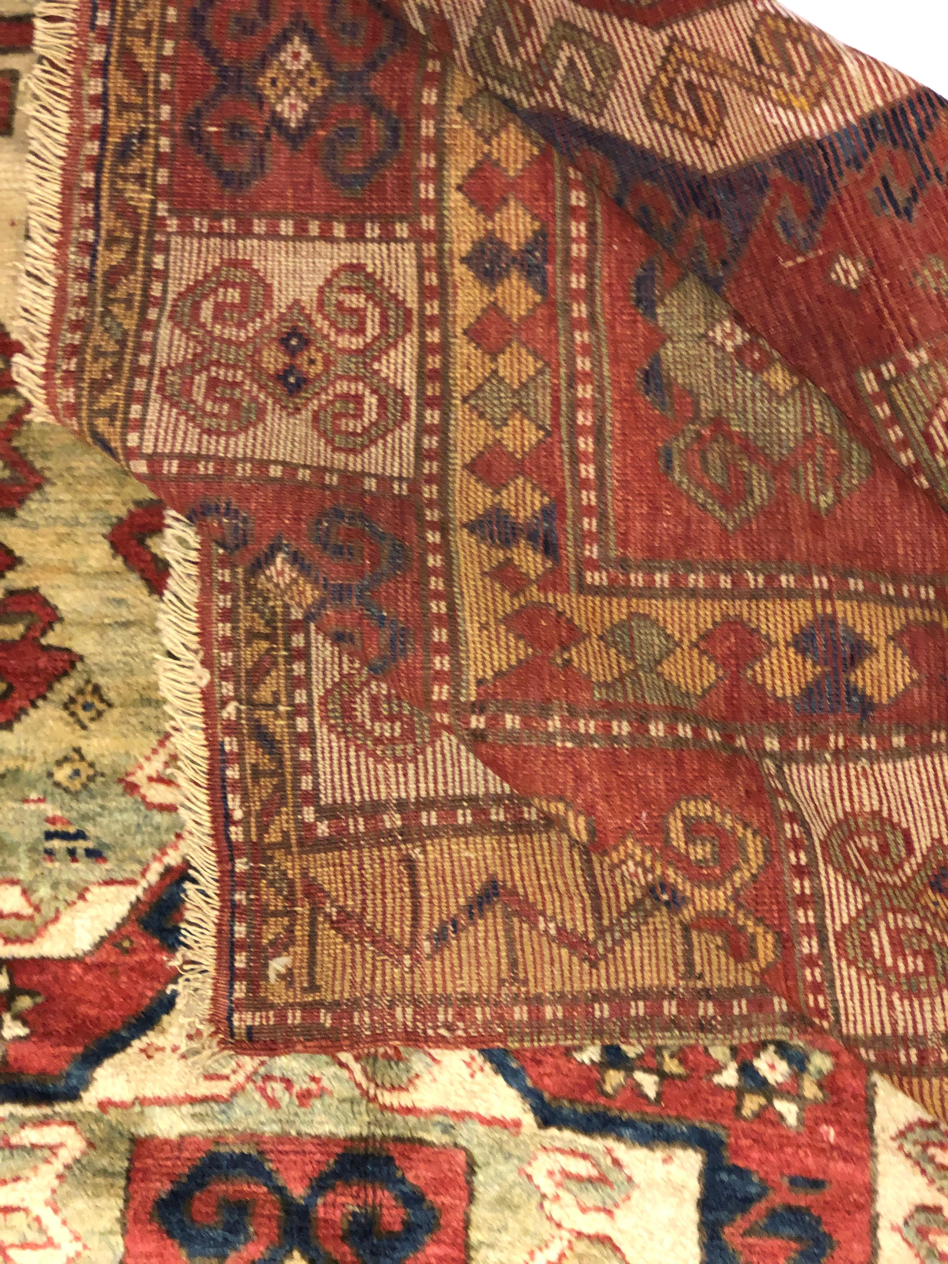 Hand-Woven Early 19th Century, Red Field, Ivory, Blue and Green, Caucasian Sevan Kazak Rug For Sale
