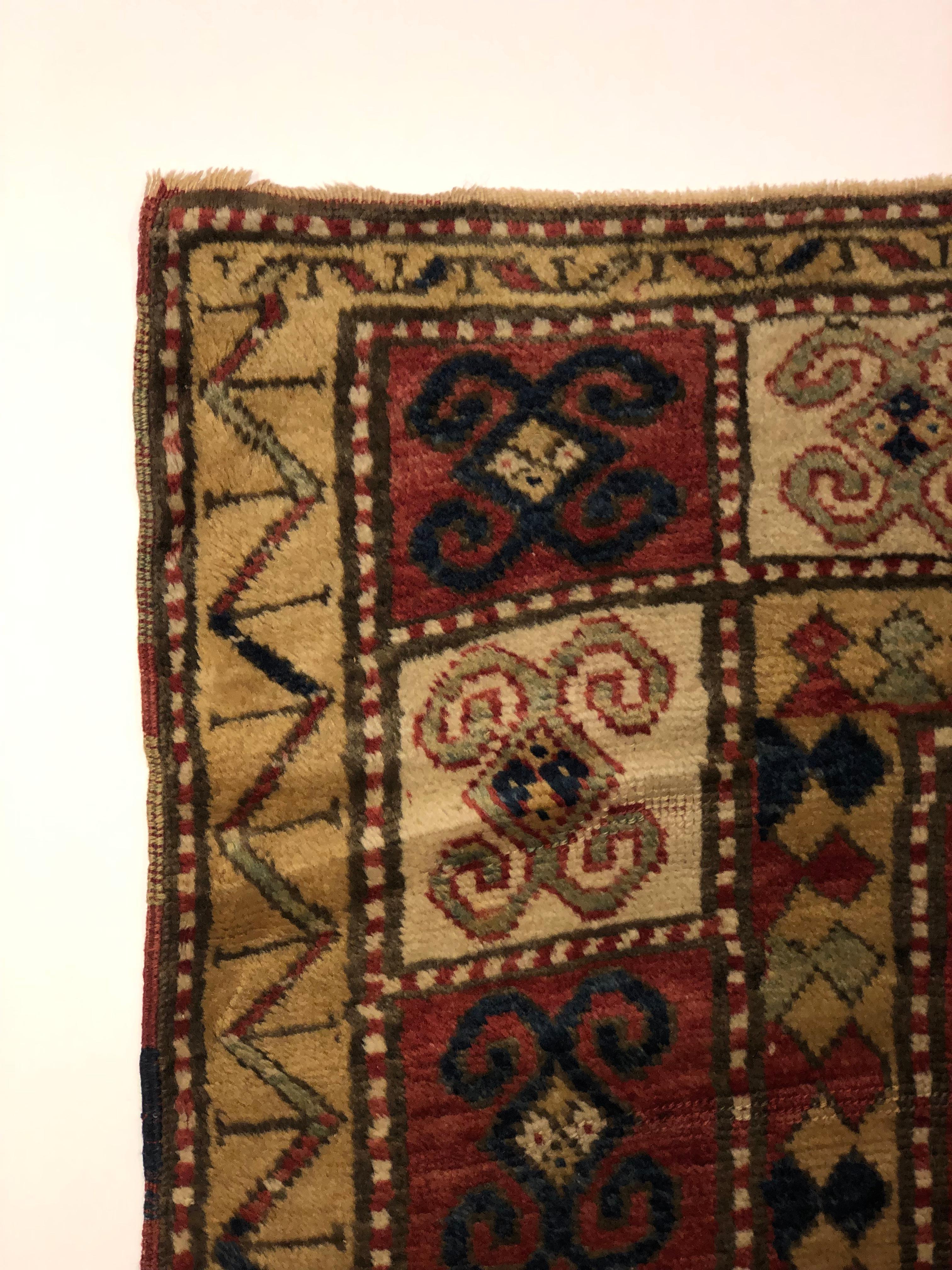 Early 19th Century, Red Field, Ivory, Blue and Green, Caucasian Sevan Kazak Rug In Good Condition For Sale In Los Angeles, CA