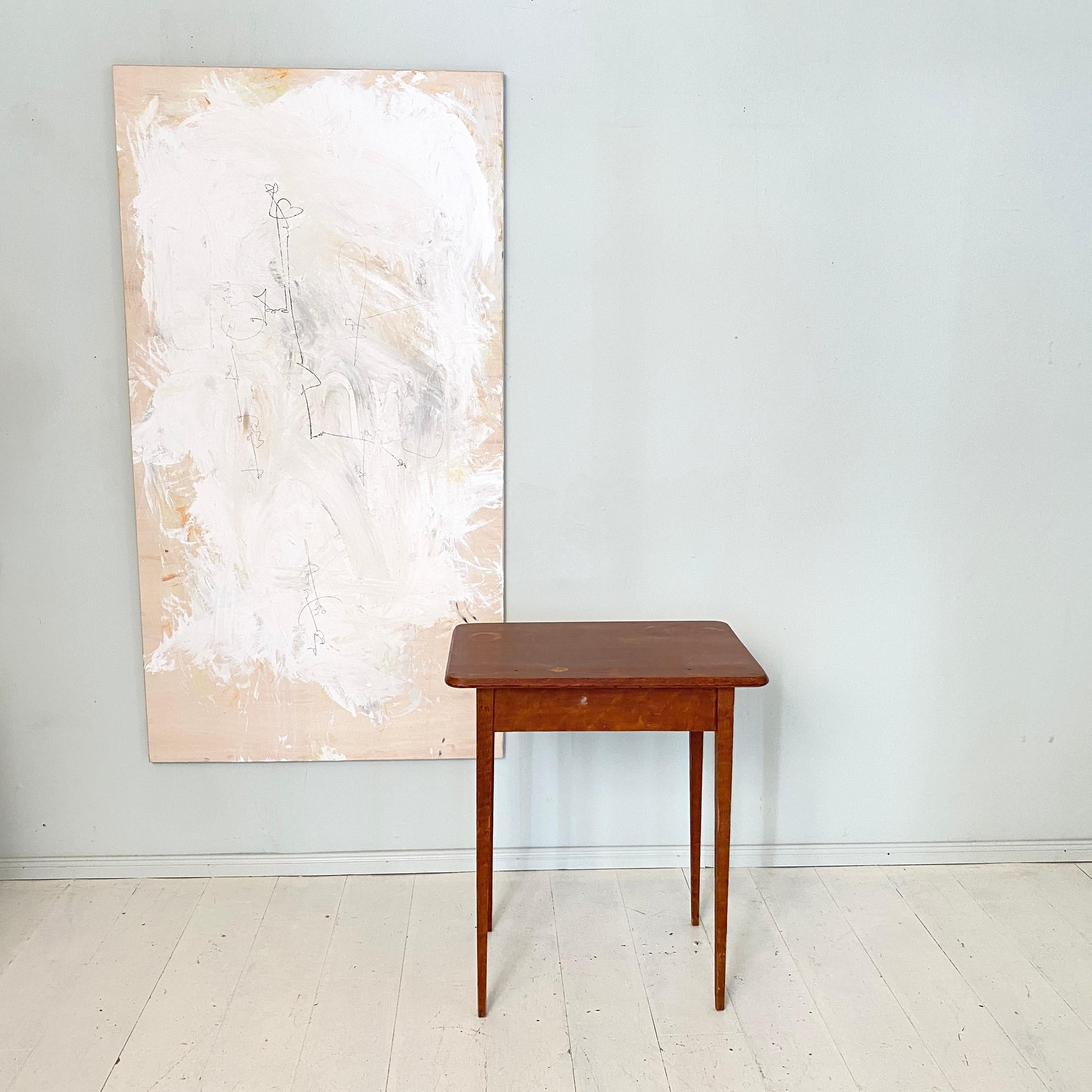 This Gustavian side-table is from the Northern Swedish country side. It was made around 1820 and is in untouched original condition with genuine wear and patina. 
The condition of the table is the authentic result of 200 years of use. 
A unique