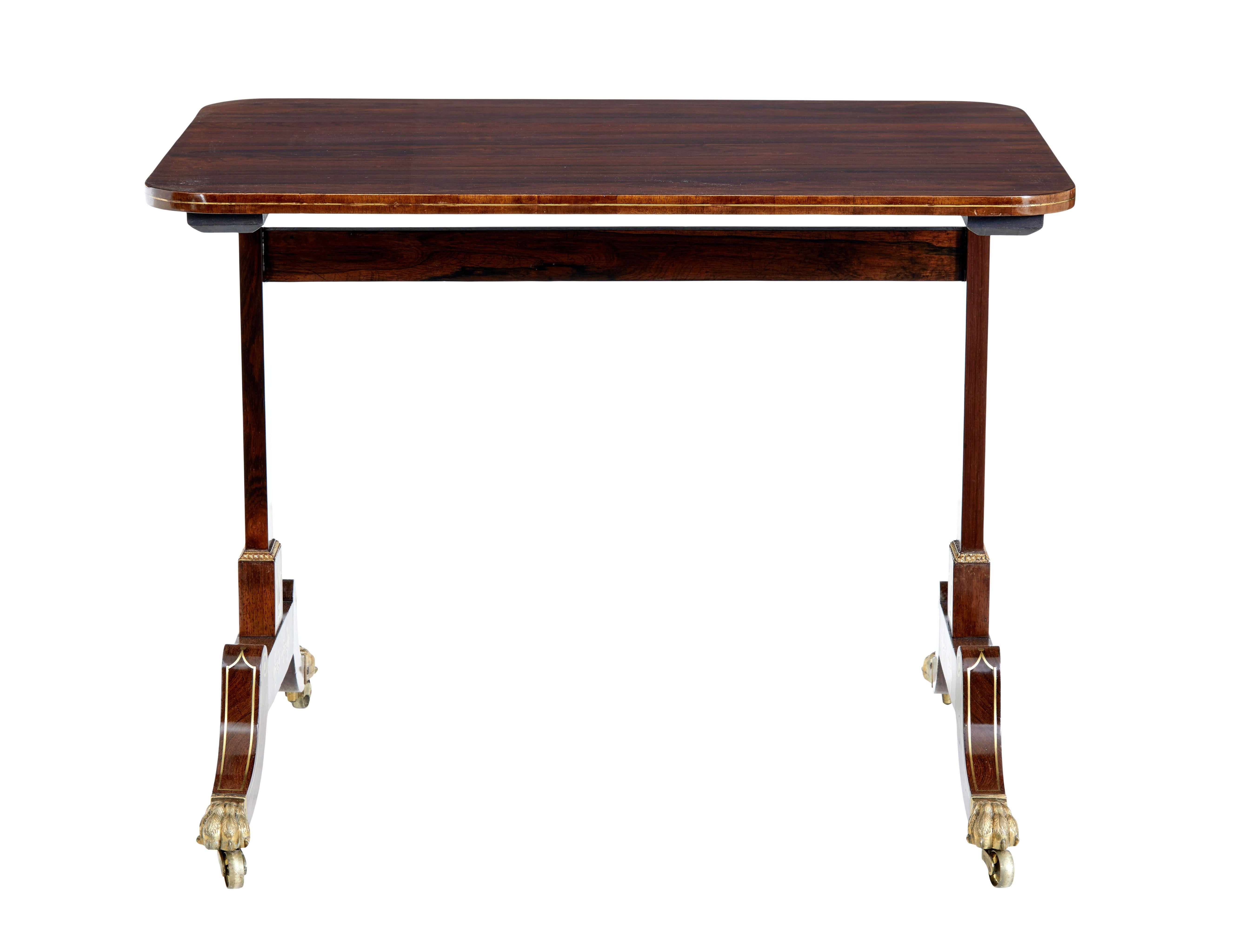 Early 19th century regency brass inlaid palisander occasional side table circa 1820.

Top quality table in good condition. Ideal for use as a side or sofa table.

Rectangular top with rounded edge with brass stringing detail. Straight supports with