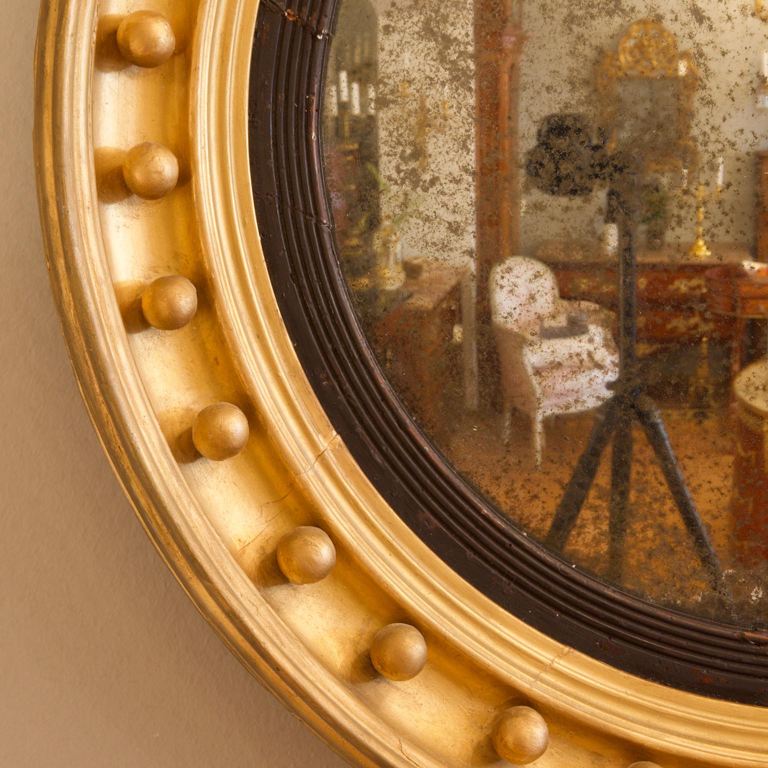 Ebonized Early 19th Century Regency Eagle Figure Round Giltwood Convex Wall Mirror