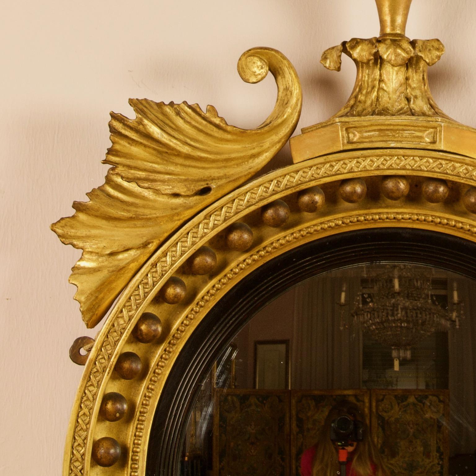 Giltwood Early 19th Century Regency Eagle Round Gilt and Ebonized Wood Convex Wall Mirror