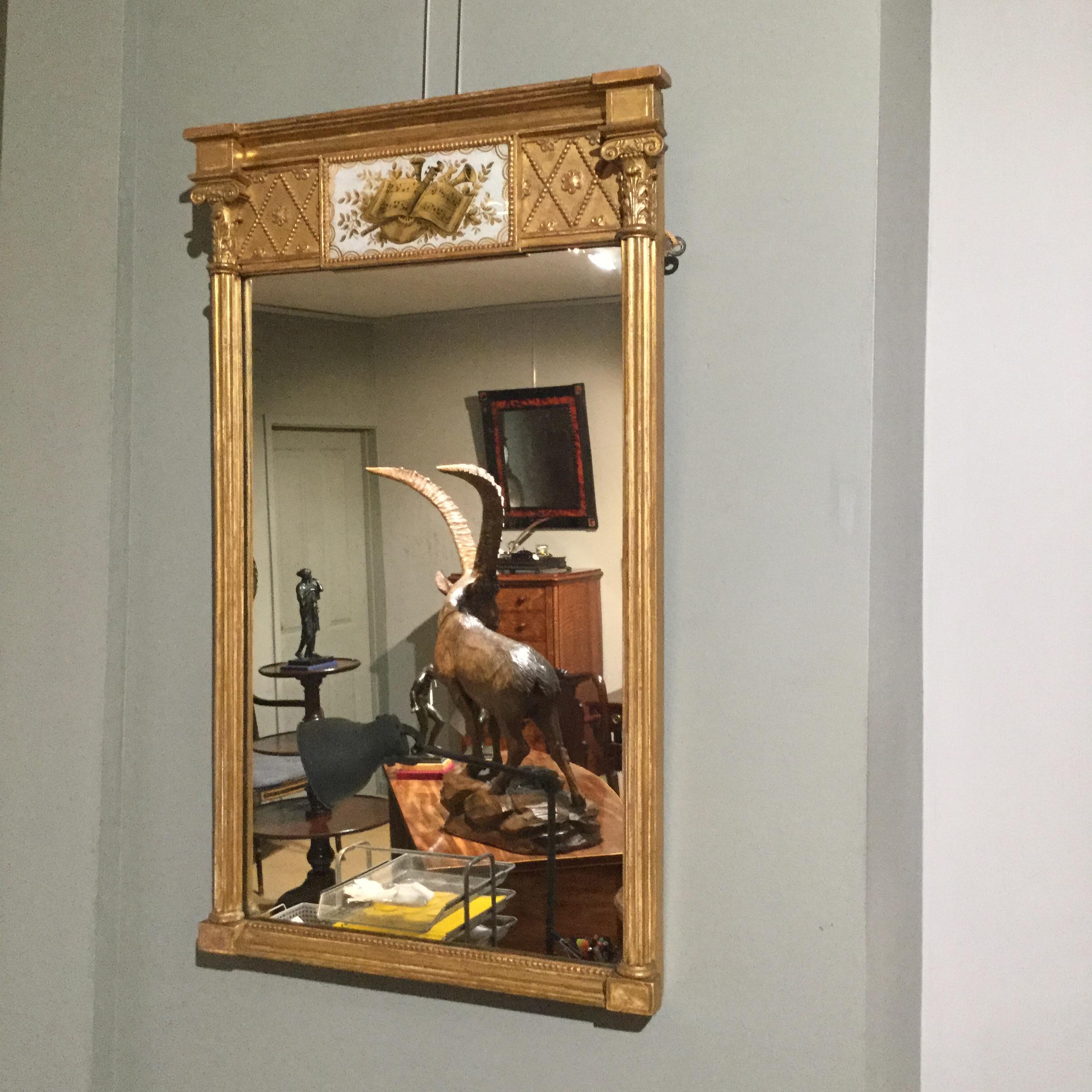 Early 19th Century Regency Églomisé Carved Pier Mirror (Englisch)