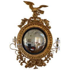 Frühes 19. Jahrhundert Regency Giltwood konvexer Spiegel mit geschnitztem Adler