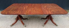 Table de salle à manger à deux piédestaux en acajou de style Régence du début du XIXe siècle
