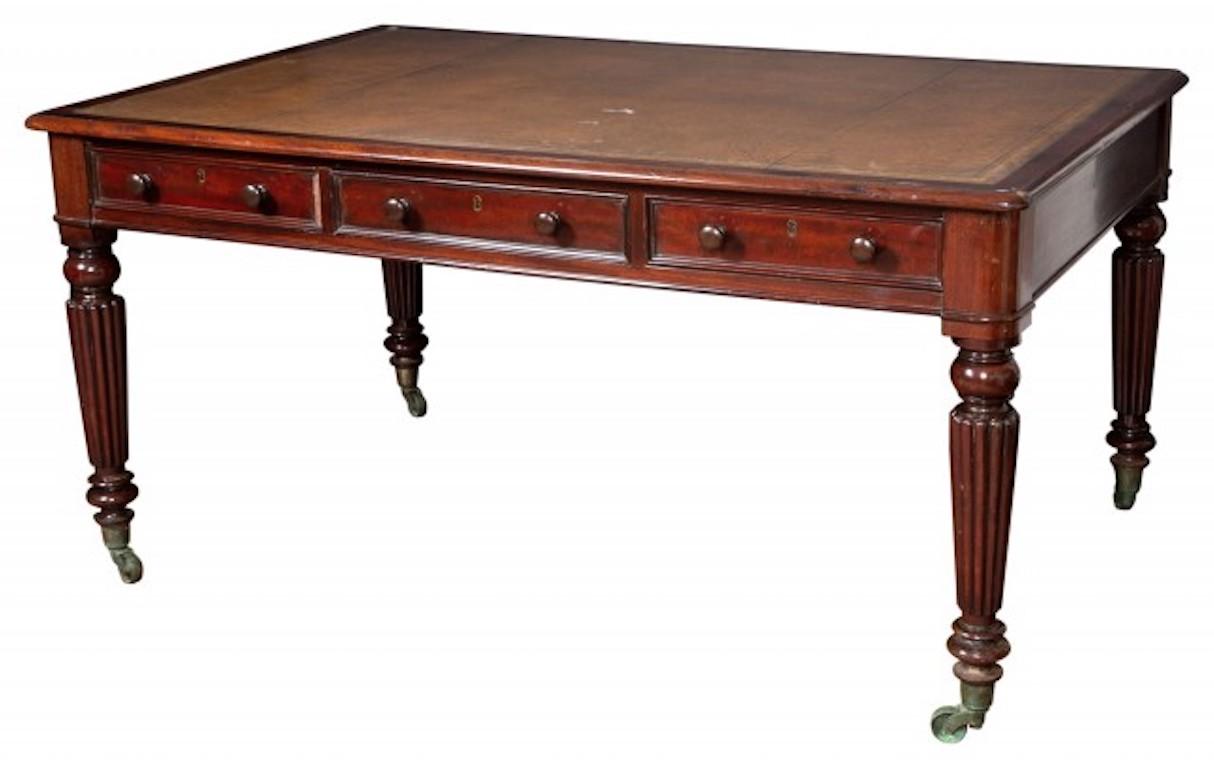 Period early 19th century Regency Mahogany Partners desk. Drawers on both sides. Great proportion. Excellent quality Mahogany. Leather top.

--Provenance: Hutton Wilkinson for Tony Duquette, Inc.