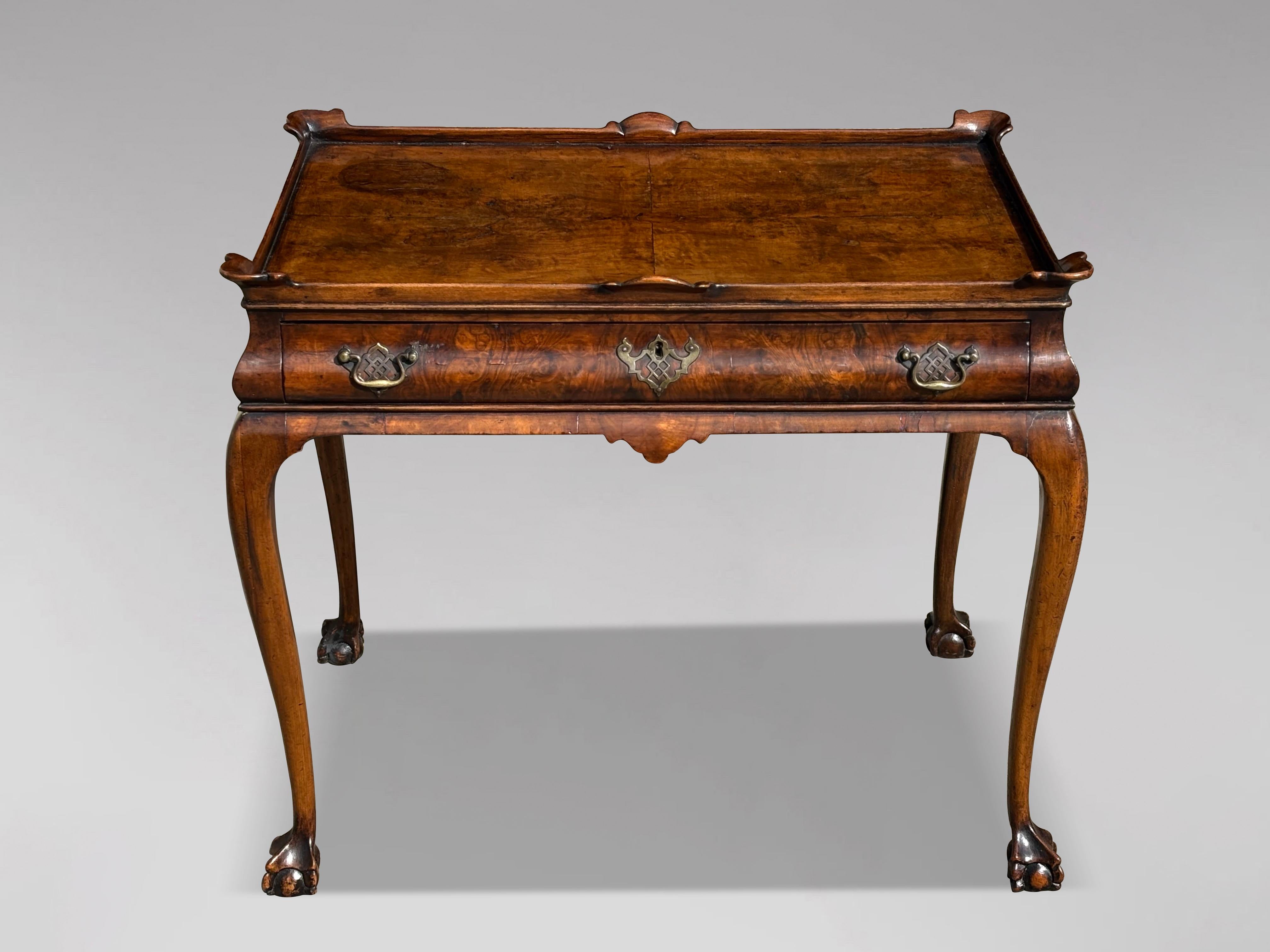 A Fine Quality Early 19th Century Regency Period Burr Walnut Silver Table 

Introducing a beautifully crafted burr walnut Regency period silver table that exudes elegance and sophistication. This finely veneered table features a quarter-veneered top