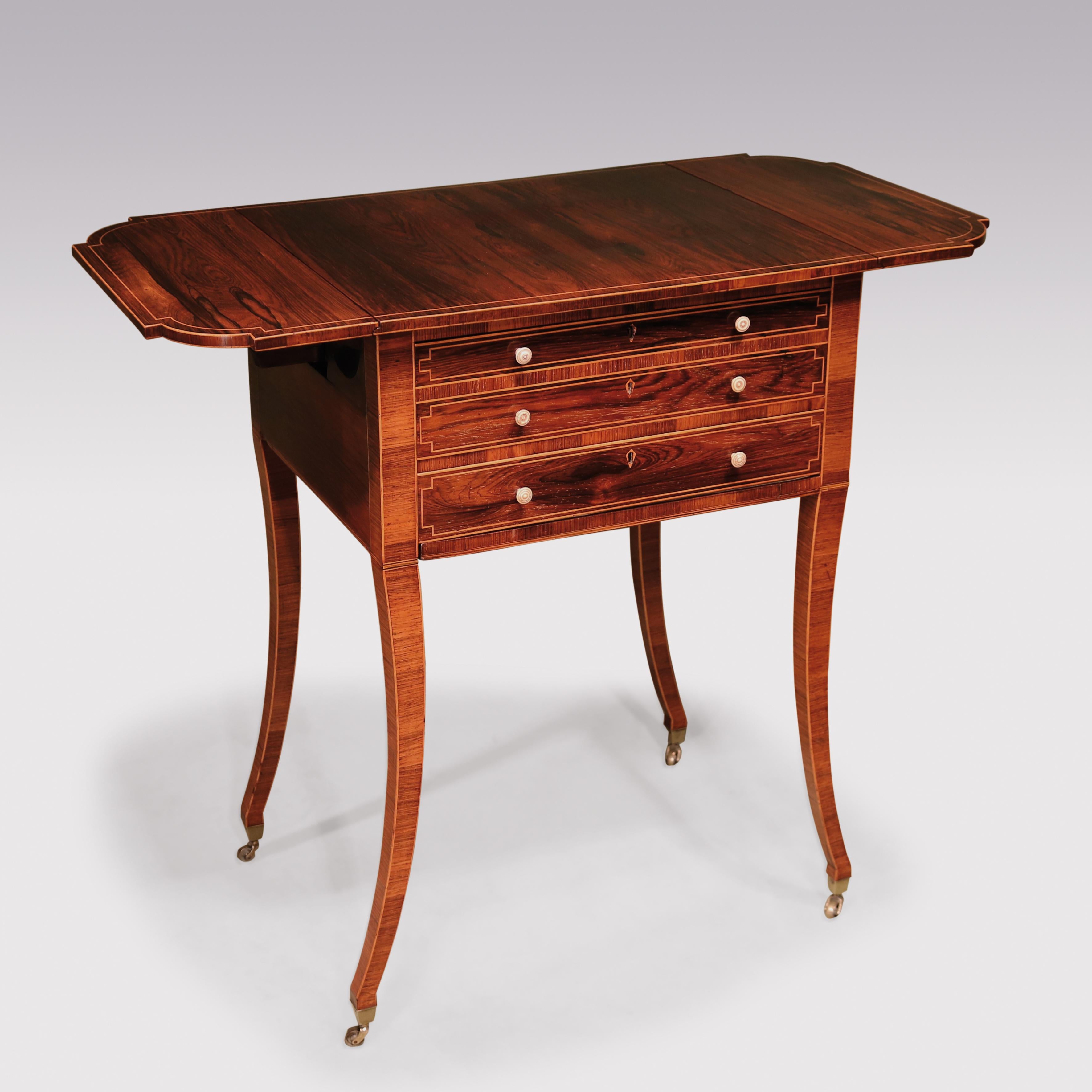 A fine quality early 19th century Regency period rosewood occasional table boxwood strung throughout, having rectangular top with breakfront bowfront flaps above 2 frieze drawers and workbox, supported on unusual cross-grain veneered sabre legs
