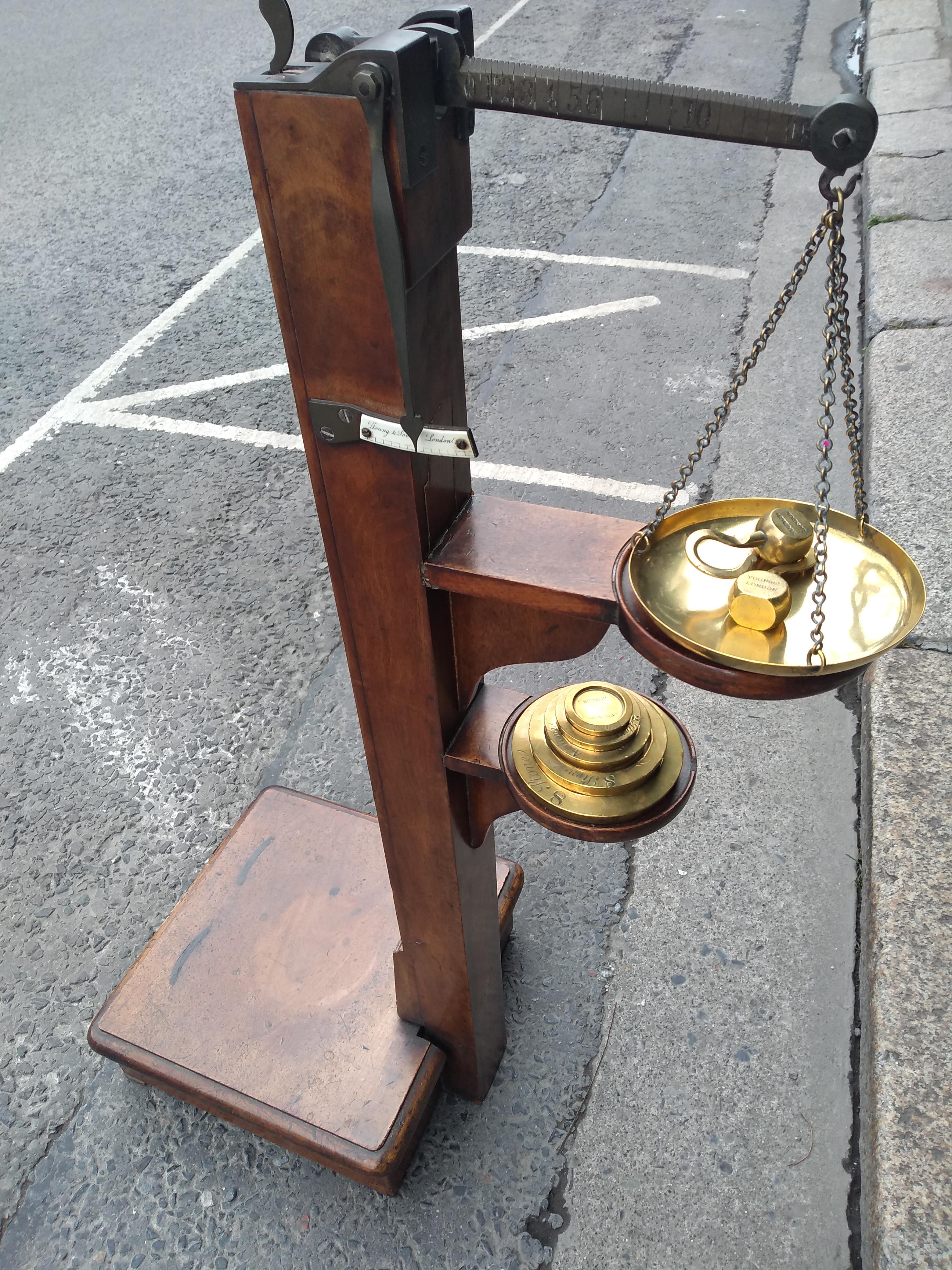 who invented the weighing scale