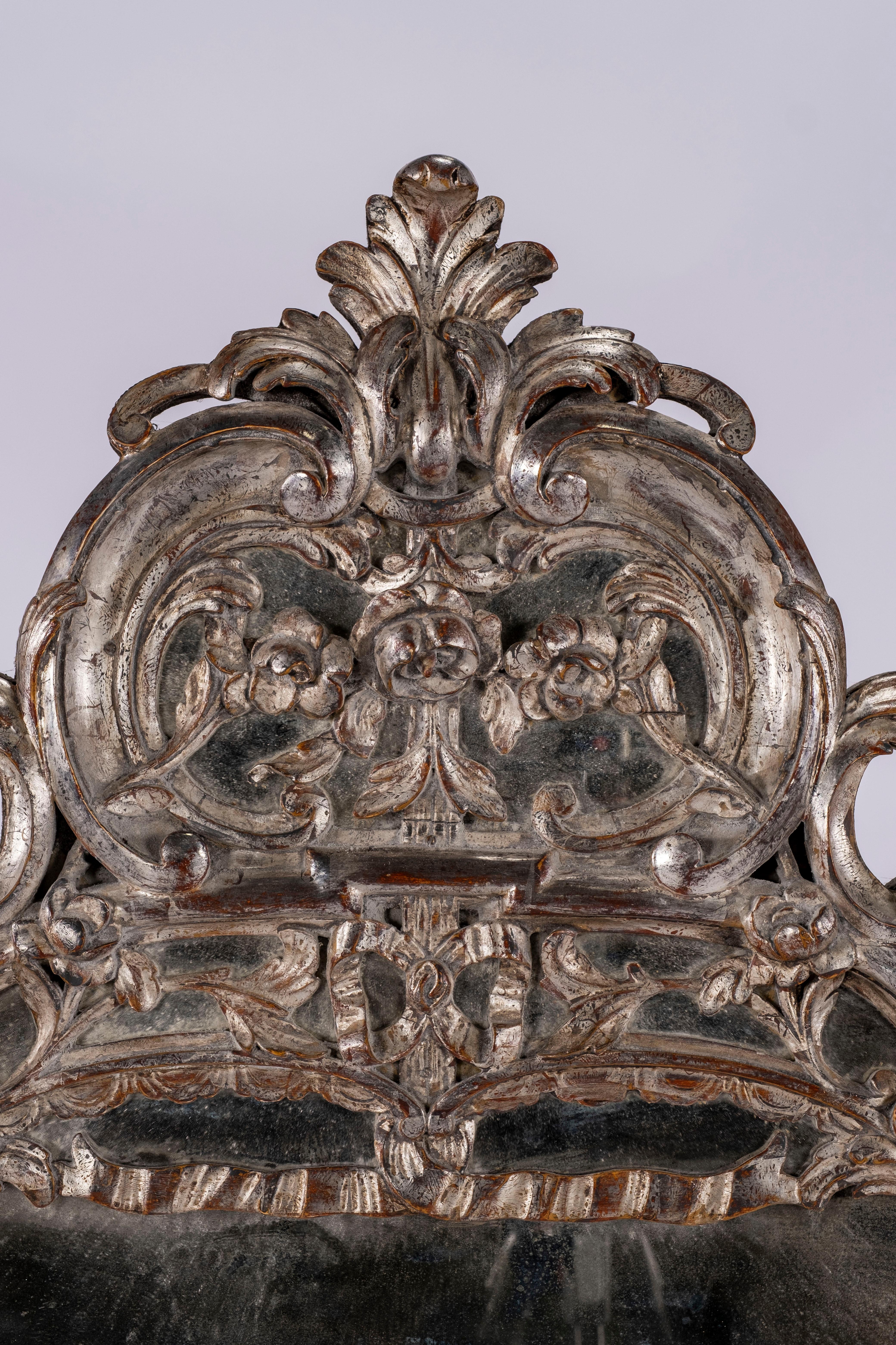 Early 19th century rococo silver mirror, Circa 1840.
  