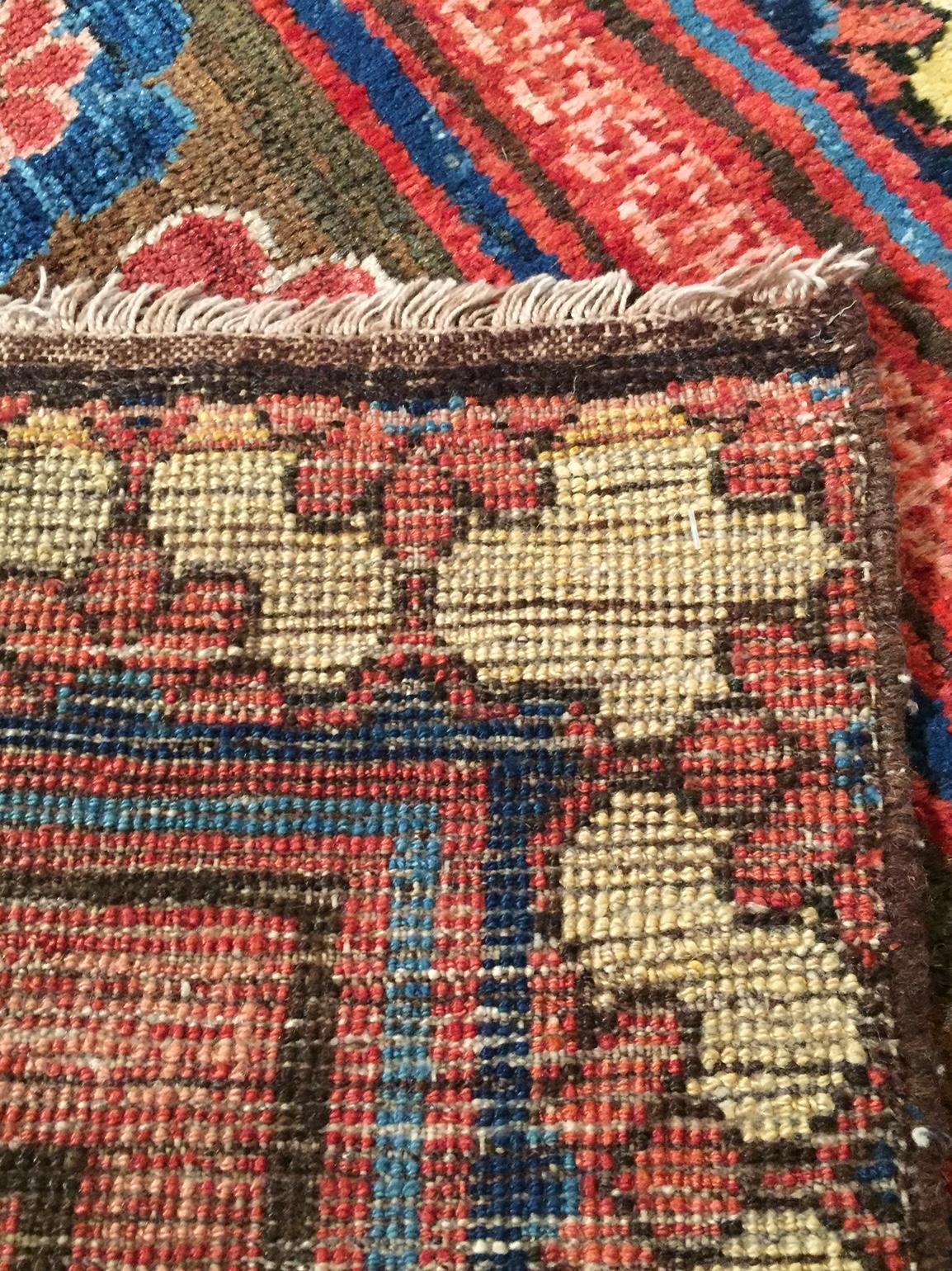 Hand-Woven Early 19th Century Rose and Blue Khotan Fragment Rug For Sale