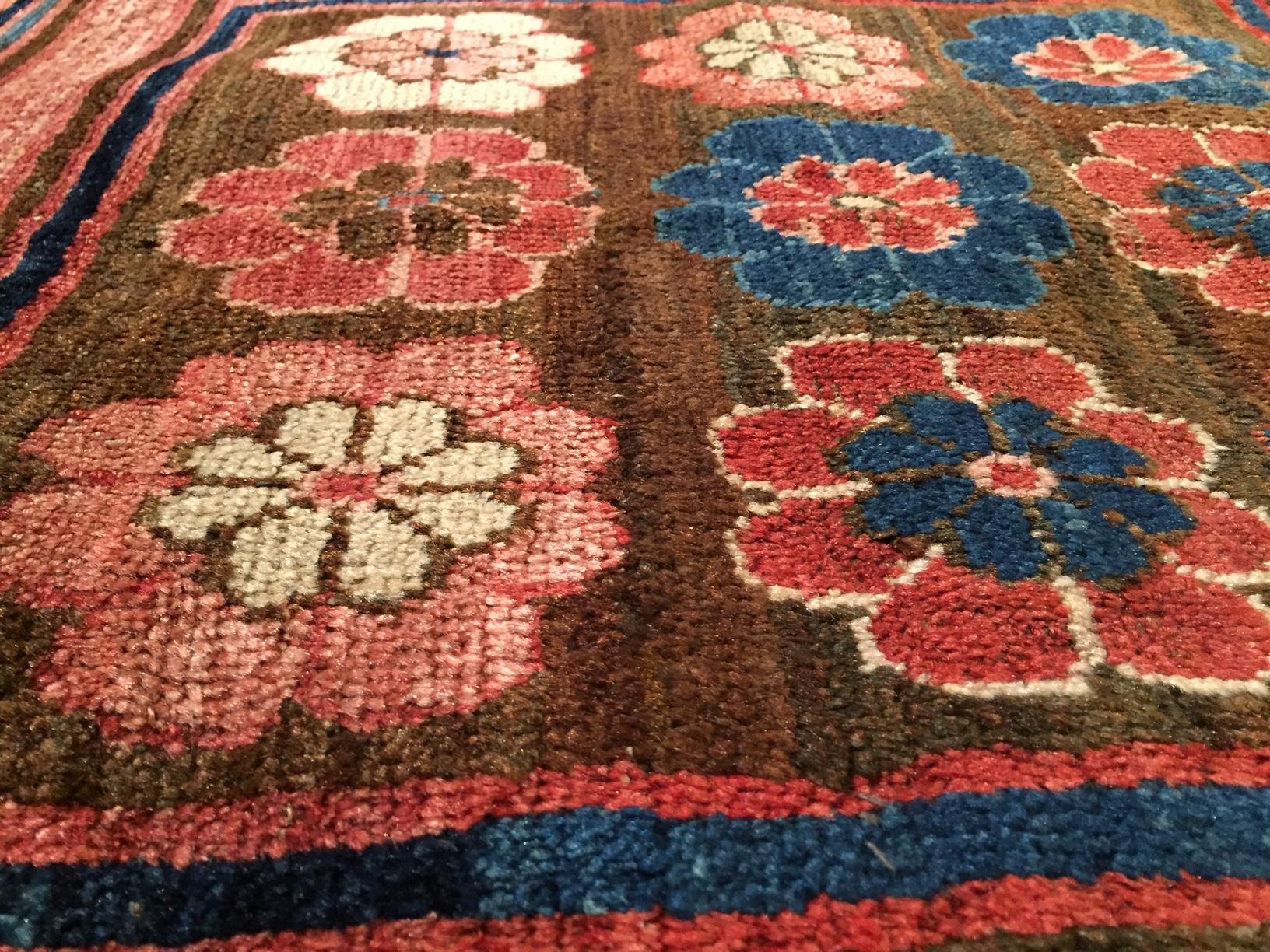 Wool Early 19th Century Rose and Blue Khotan Fragment Rug For Sale