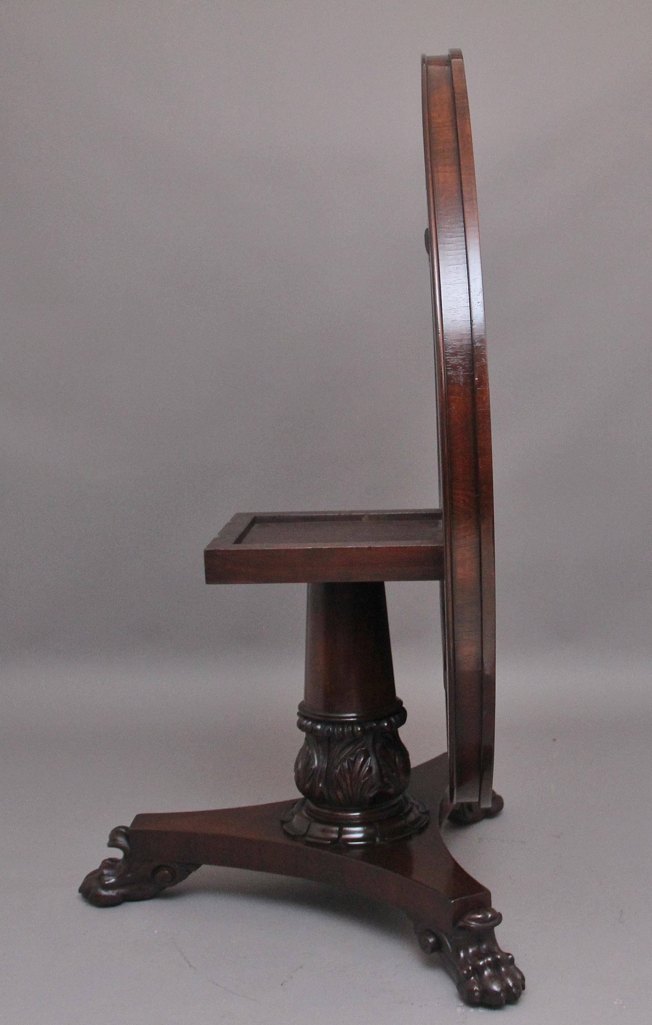 19th Century rosewood tilt top breakfast / centre table, with a beautifully figured top with frieze below, supported on a turned column with lovely crisp carved tulip decoration at the bottom, resting on a tri platform base terminating on carved