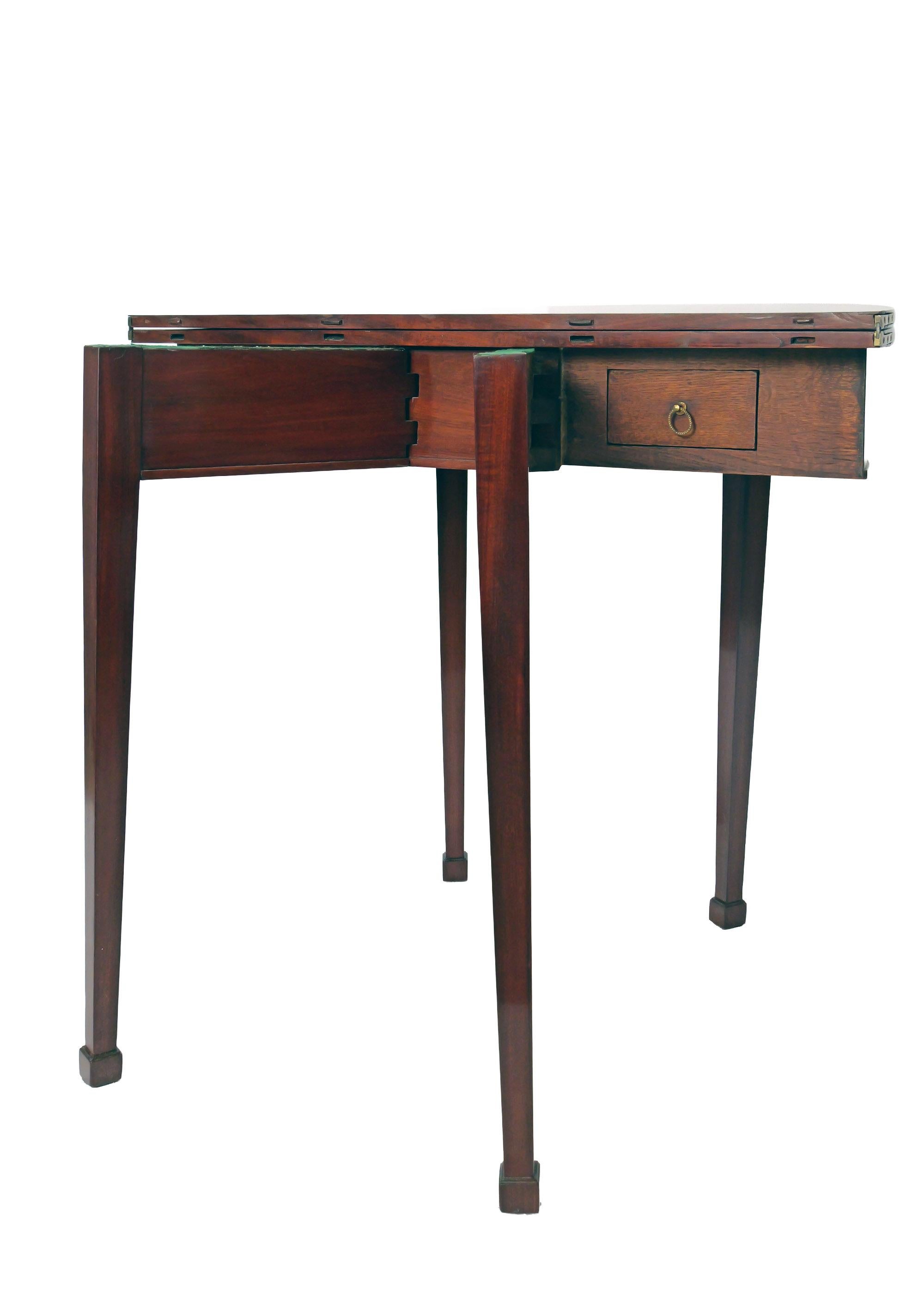 Mogano Early 19th Century Round, folding Demi Lune Mahogany Game Table, German in vendita