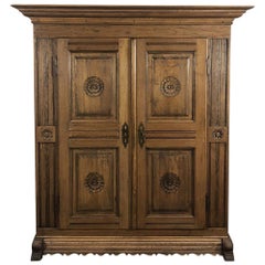 Early 19th Century Rustic Dutch Stripped Hand-Carved Oak Armoire