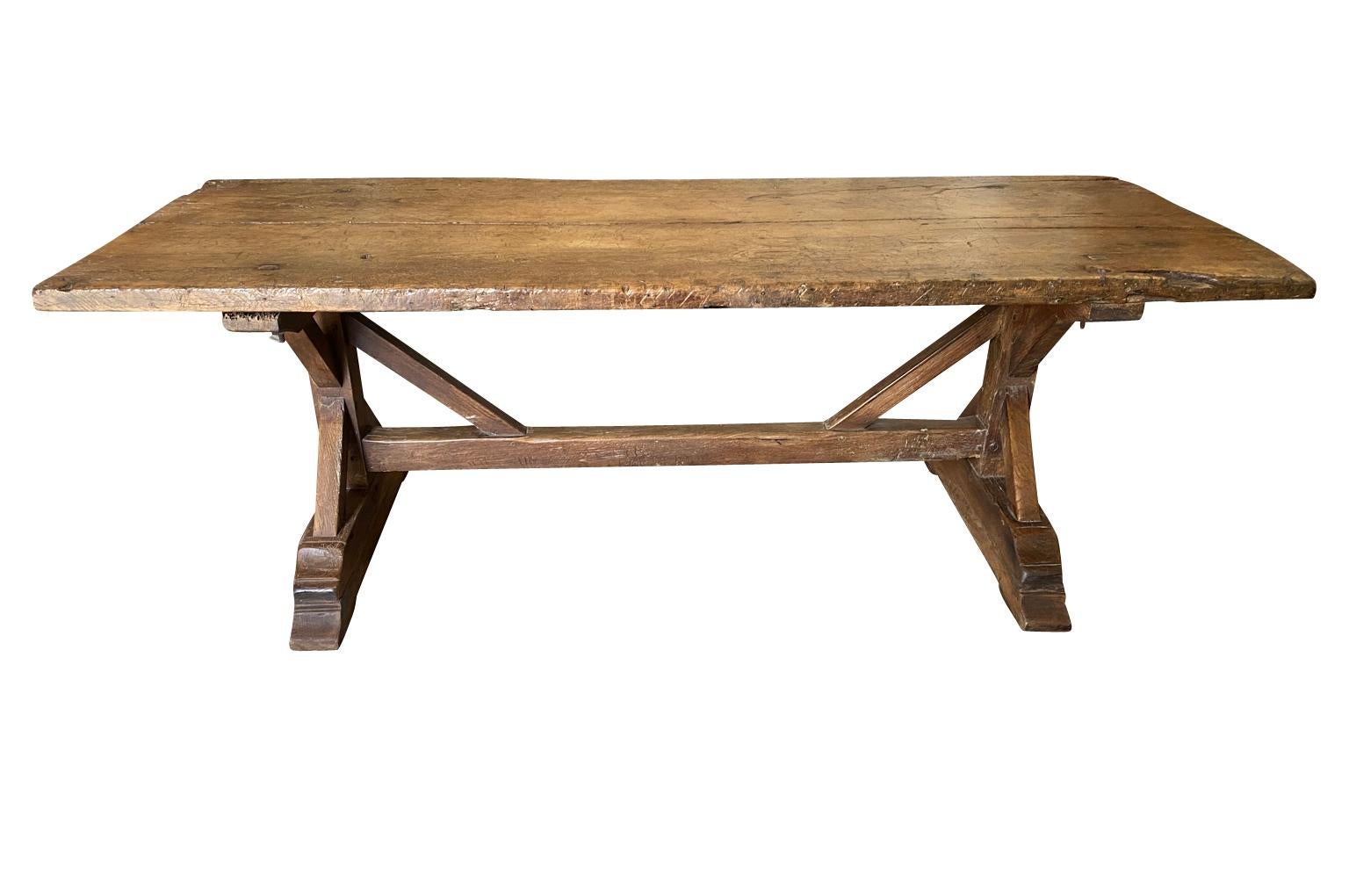 A very handsome early 19th century Farm Table - Trestle Table beautifully constructed from richly stained oak with wonderful 