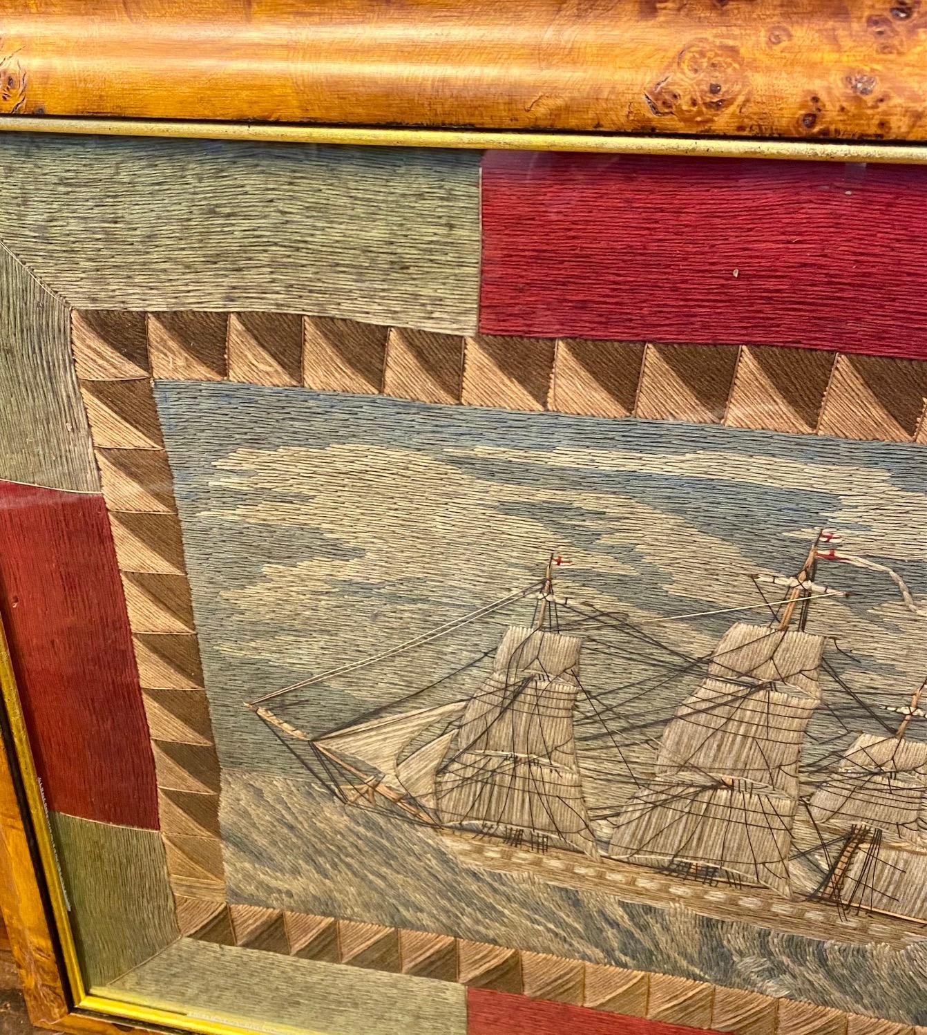 Early 19th century Sailor's Woolwork, circa 1830s - 1840s, depicting a British single decker warship under reefed top-gallant sails, in fantastic high seas under a wild sky, set within a bold sawtooth border. Retaining an old label from The Casson
