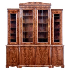 Early 19th Century Scandinavian Empire Flame Mahogany Breakfront Bookcase