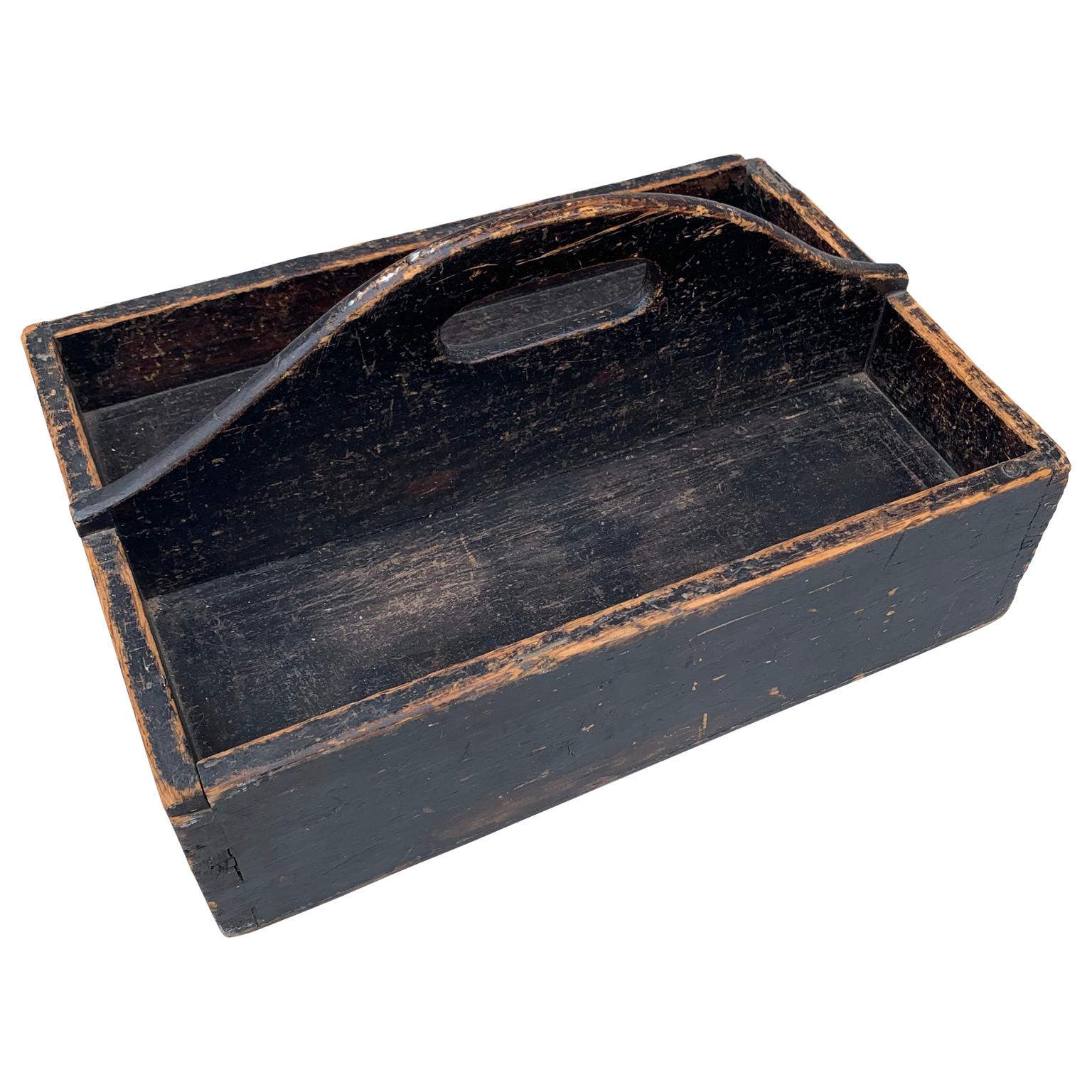 Early 19th century Scandinavian Folk Art kitchen silverware and spices box in old black color.