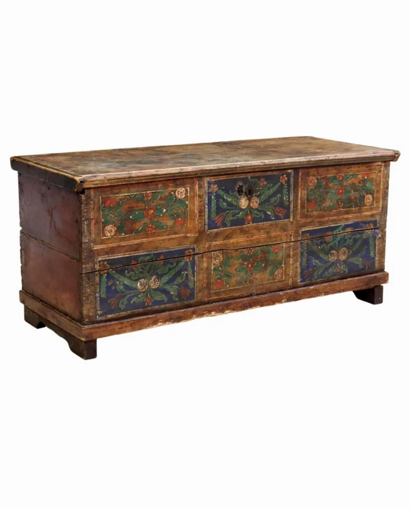 A charming rustic antique Scandinavian paint-decorated pine storage trunk blanket chest with beautifully aged distressed patina.

Handcrafted of solid pine wood in Scandinavia in the early 19th century, likely Swedish, high quality handcut