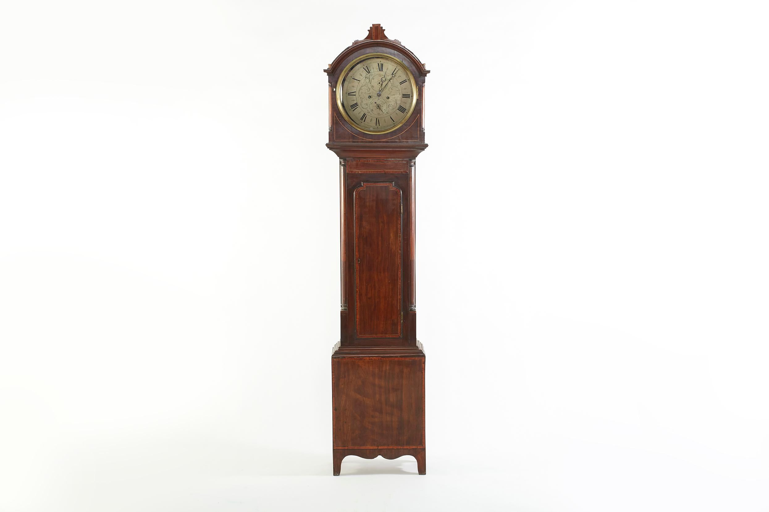 18th century Colin Croll Scottish drumhead tall case clock in mahogany case with banded veneer panels. The case clock has brass face 8-day time and strike movement with silvered dial. The clock is in good antique condition with minor wear & loss
