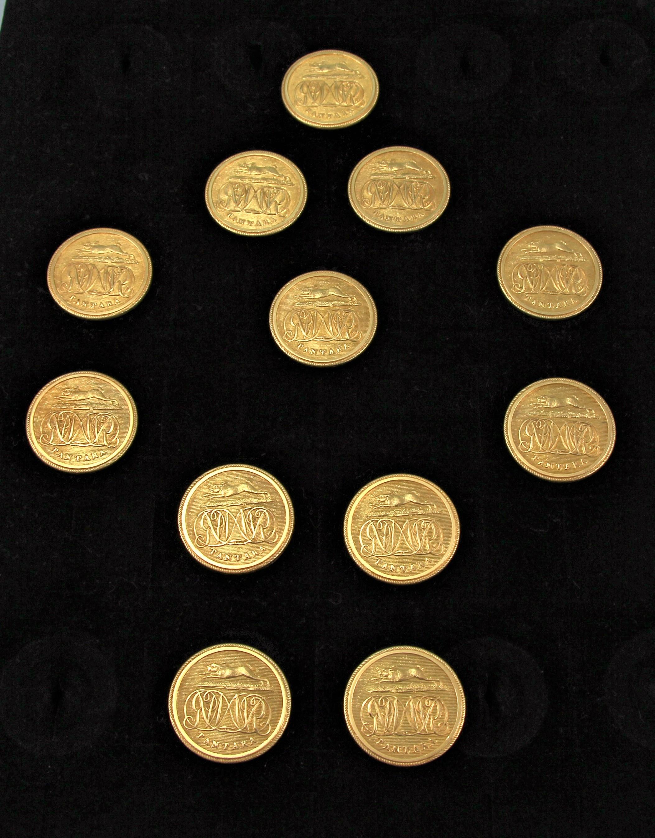 Very charming early 19th century set of 12 brass gilt hunting buttons. 
Maker: Firmin & Langdale, London, circa 1817. 

Each button illustrates the same initials and scene depicting a hound in full pursuit with the inscription 'Tantara' meaning