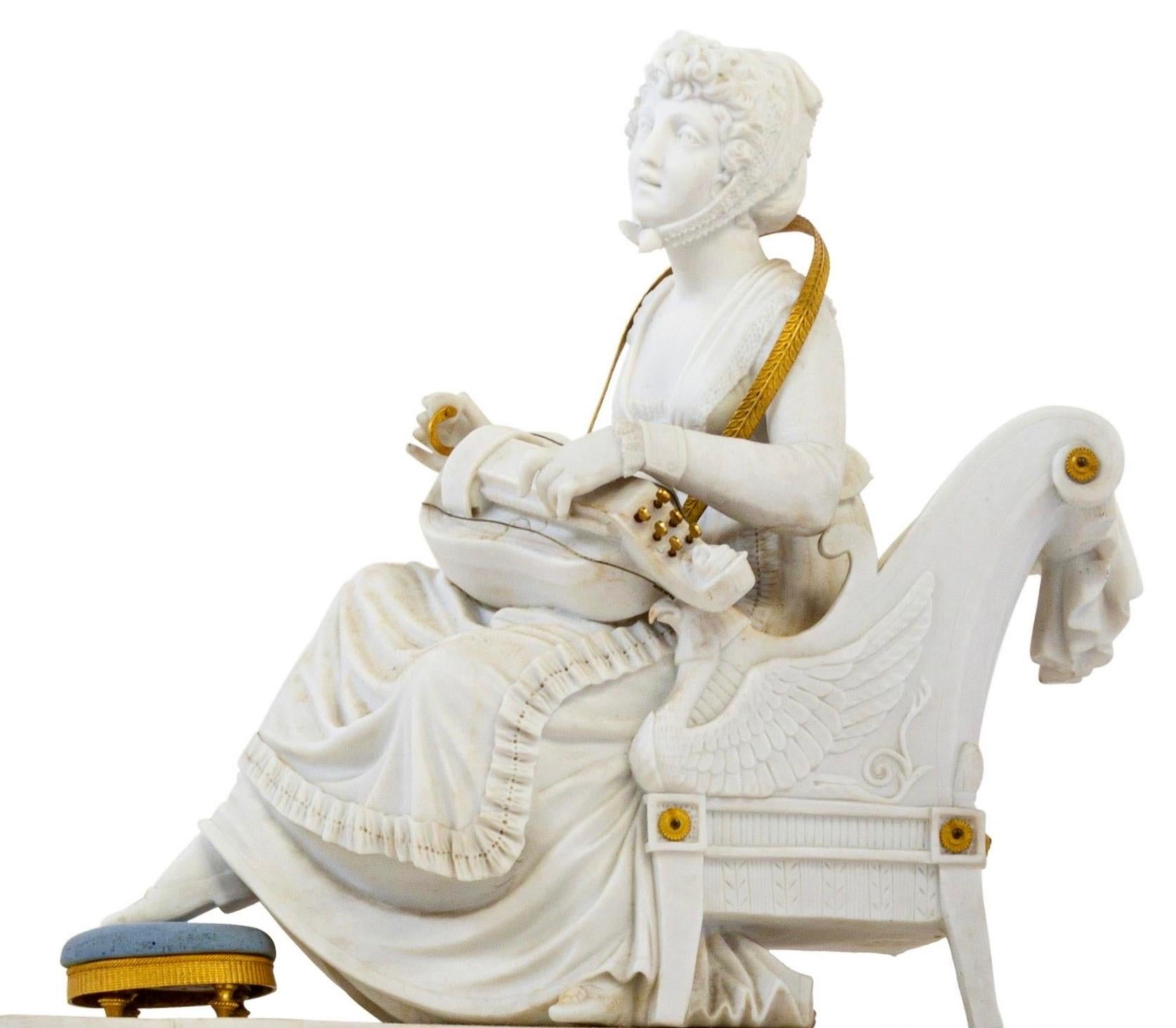 Period early 19th century Directoire clock attributed to Sèvres. Beautifully sculpted biscuit porcelain in white and Wedgwood blue jasper ware color. Ormolu mounts. Of a seated lady in neoclassical attire, sitting in a griffin motif armchair playing