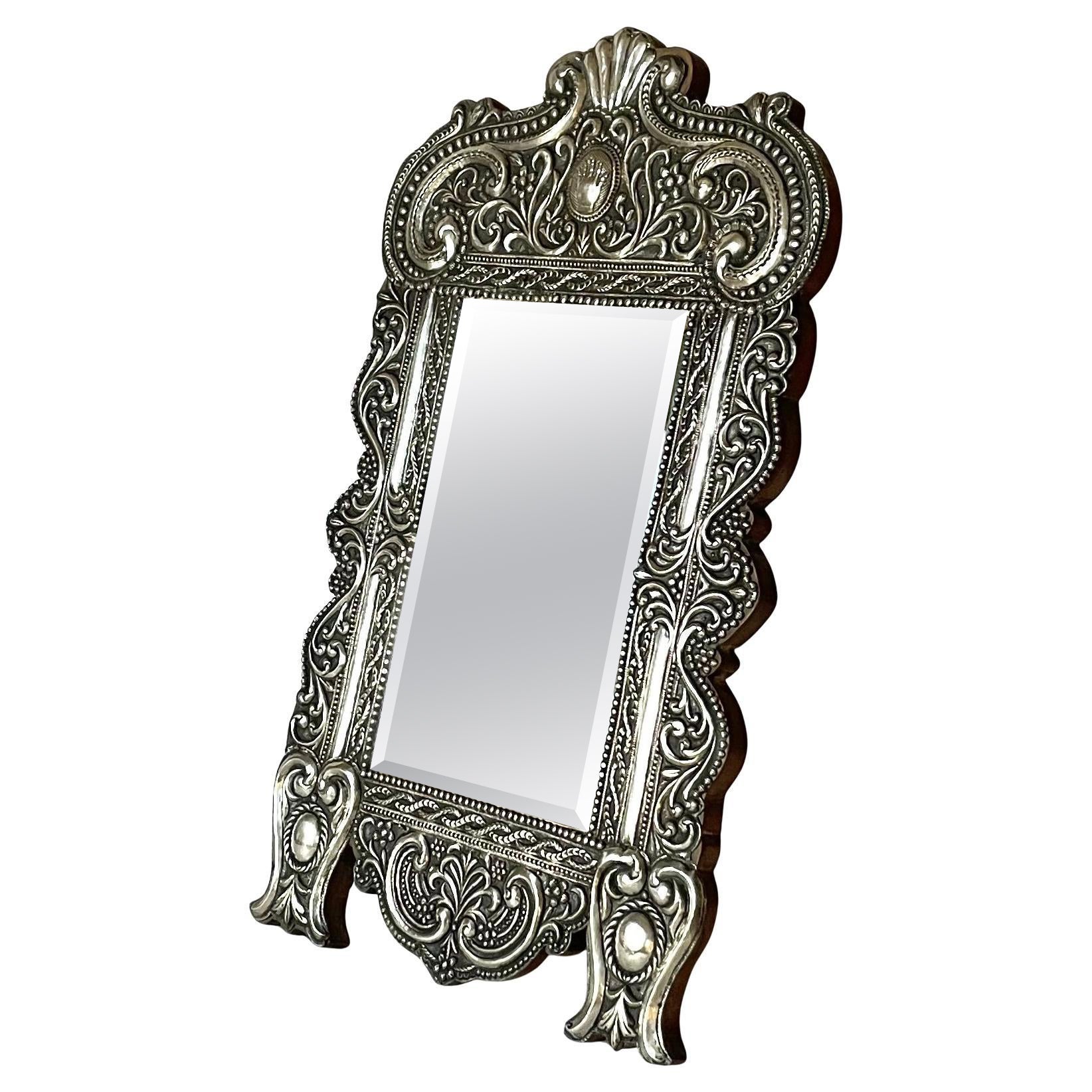 Early 19th Century Silver Table Mirror with Richly Decorated Frame