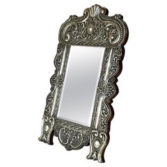 Early 19th Century Silver Table Mirror with Richly Decorated Frame
