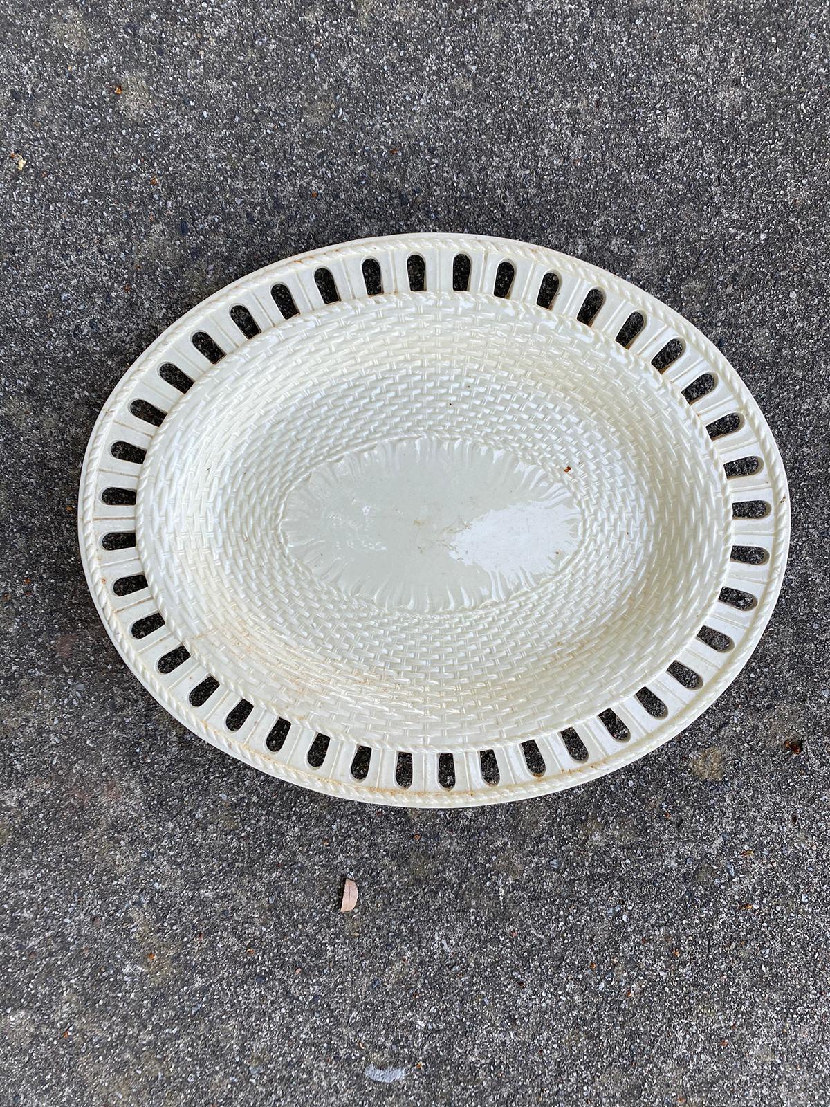 Early 19th century single reticulated creamware oval plate, unmarked.