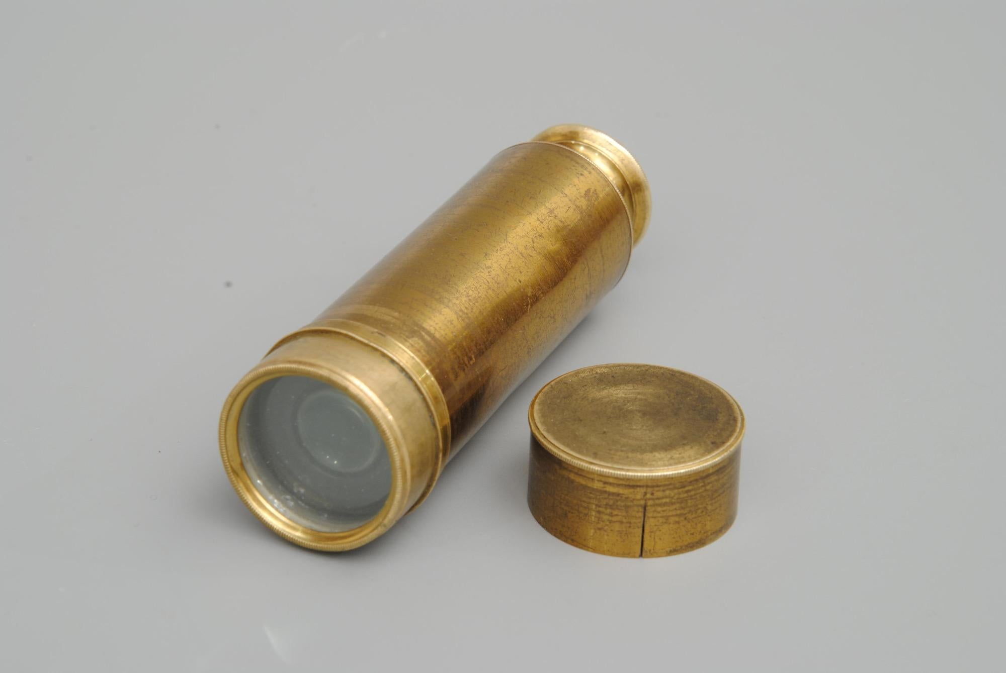 An early 19th century lacquered brass six drawer pocket telescope by Cary, London. Unusual focusing line on the second drawer, the scope complete with end cap.