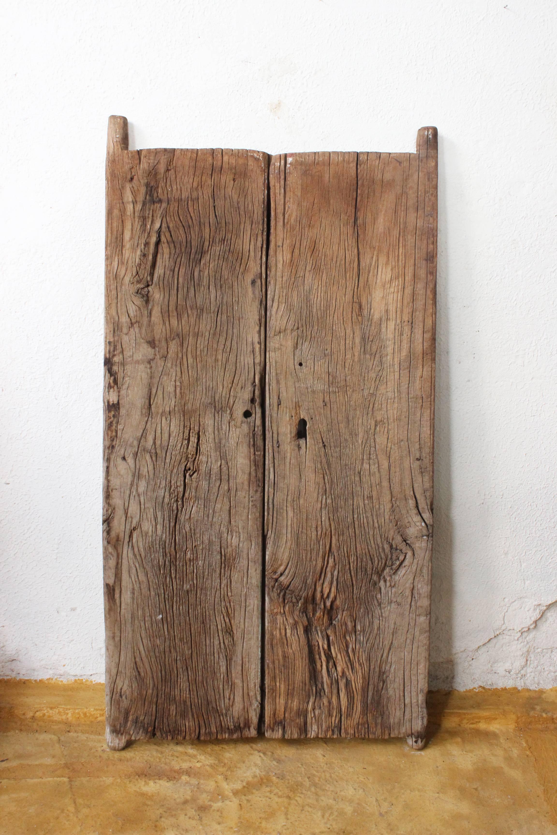 This amazing 19th century solid mezquite wood gate is great to give a cozy touch to decoration, both doors are perfectly functional and they have this exquisite patina only given by the passage of centuries.