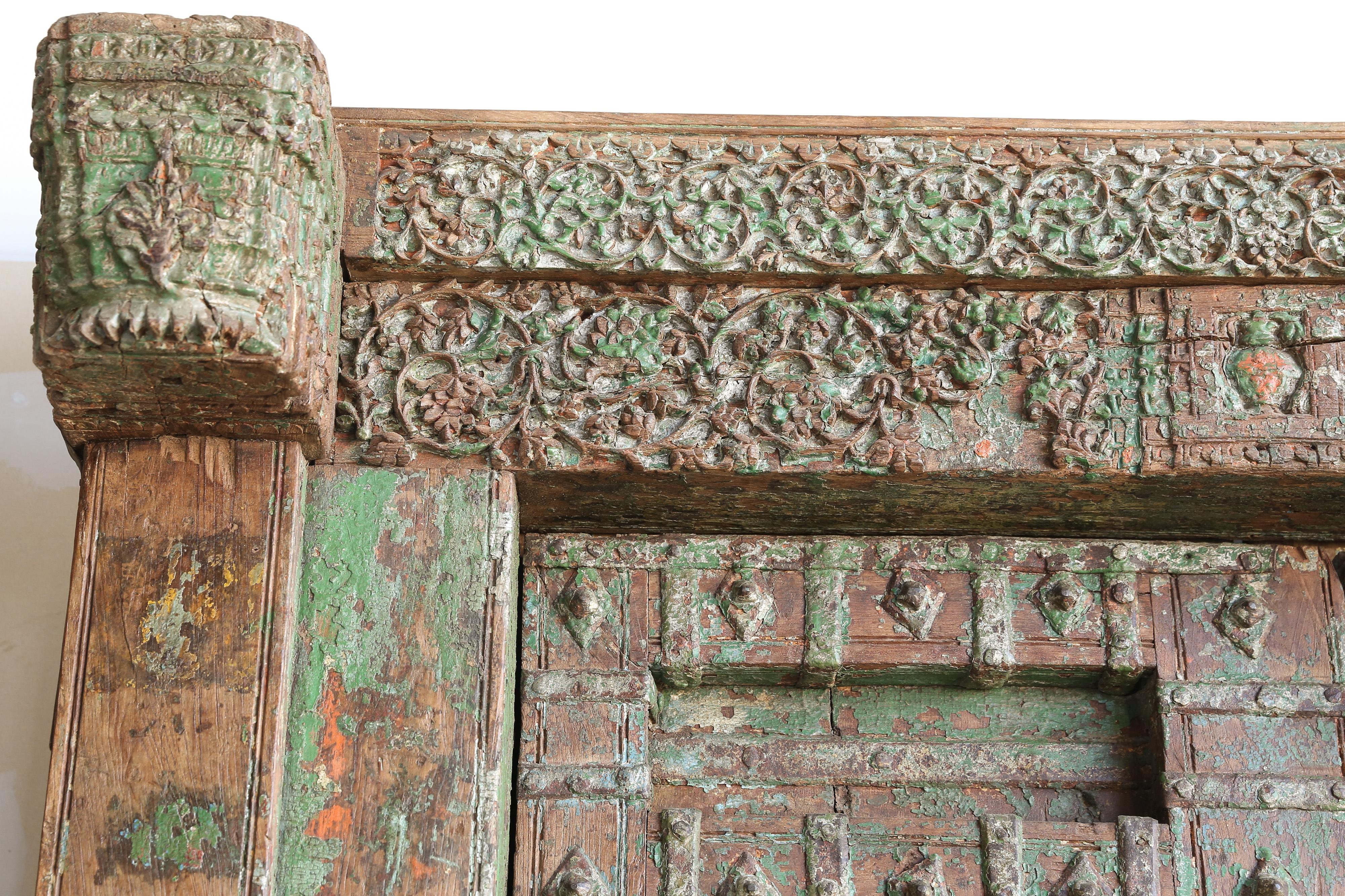 Indian Early 19th Century Solid Teak Wood Highly Carved Entry Doors of a Village Temple For Sale