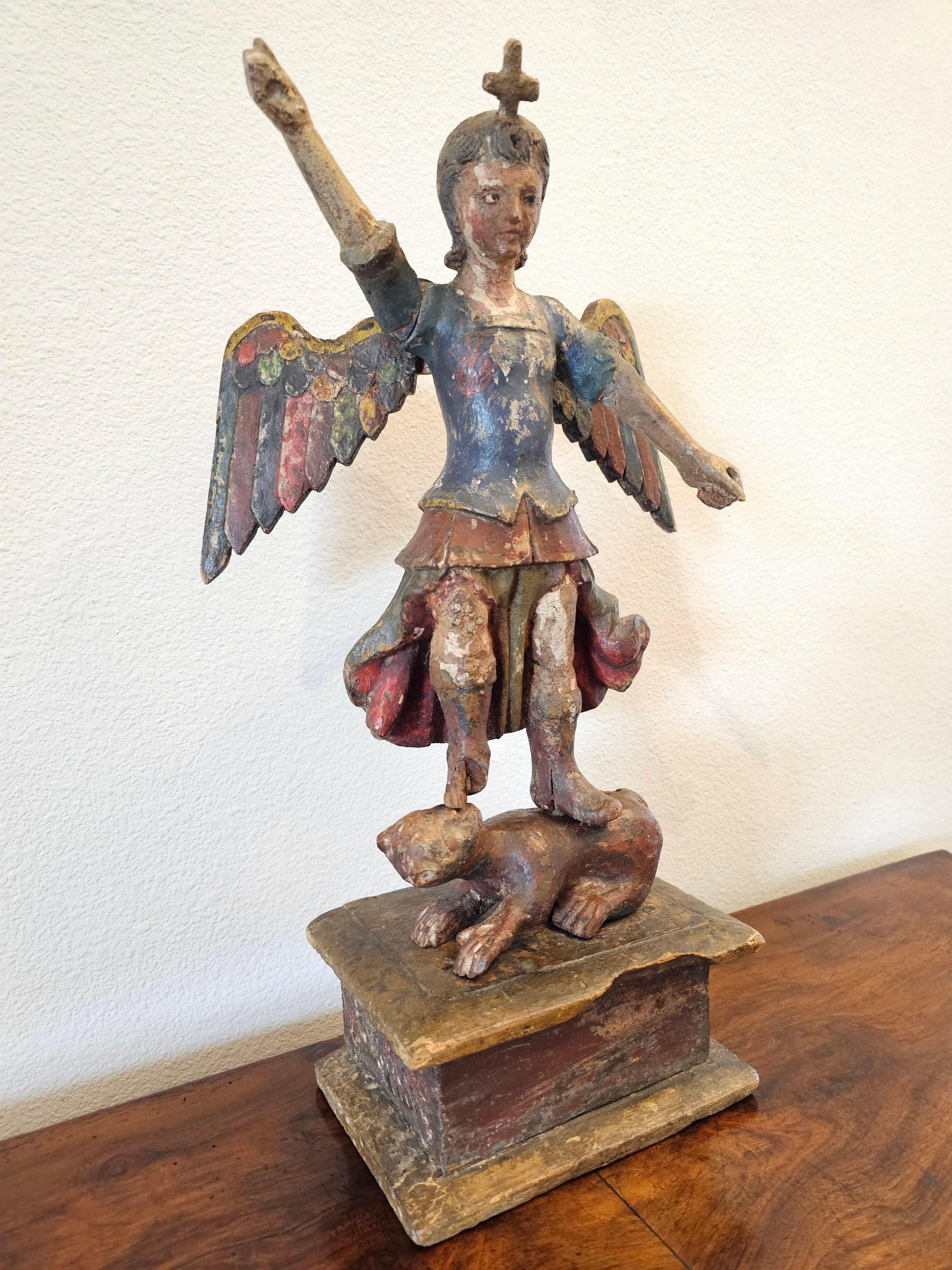 A wonderful rare large hand carved and painted Spanish Colonial Mexican santo altar figure, Saint Michael the Archangel standing over defeated Satan, circa 1800

Hand-crafted in New Spain (present day Mexico) in the early 19th century,