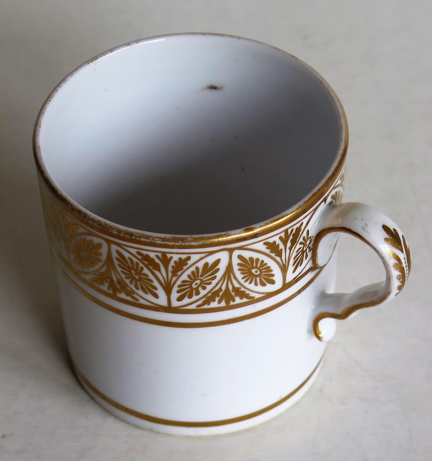 This is a good example of an English George III period, porcelain, coffee can (cup), made by Spode in the early 19th century, circa 1810.

The can is nominally straight sided and has the Spode loop handle with a pronounced kick or kink to the