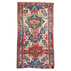 Early 19th Century Star Kazak Rug, Caucasus, 3′2″ × 6′9″