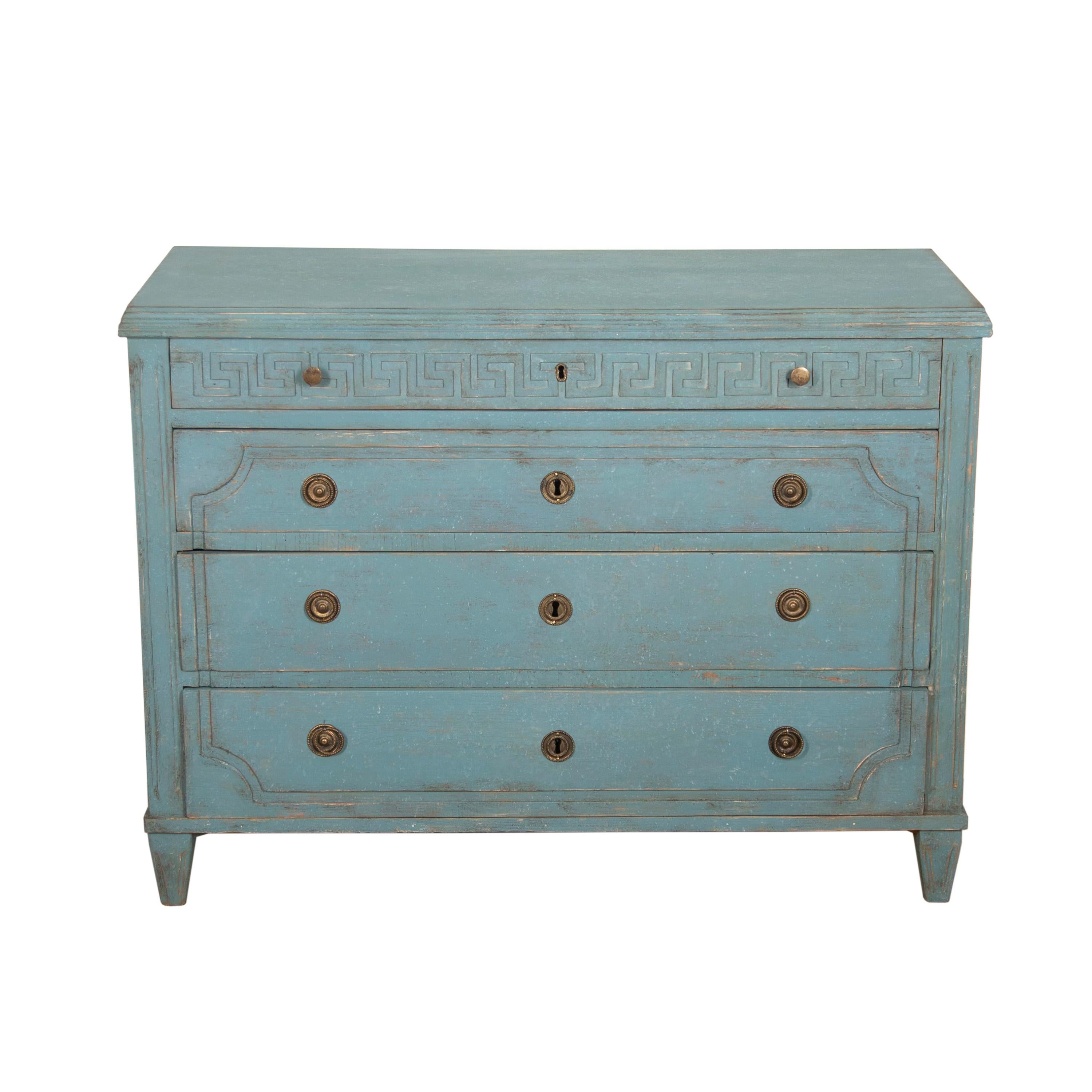 Early 19th century Swedish commode.
This commode retains period details which include a decorative Greek key design to the frieze and original hardware. 
Featuring a wonderfully painted light blue surface and colour throughout, this commode