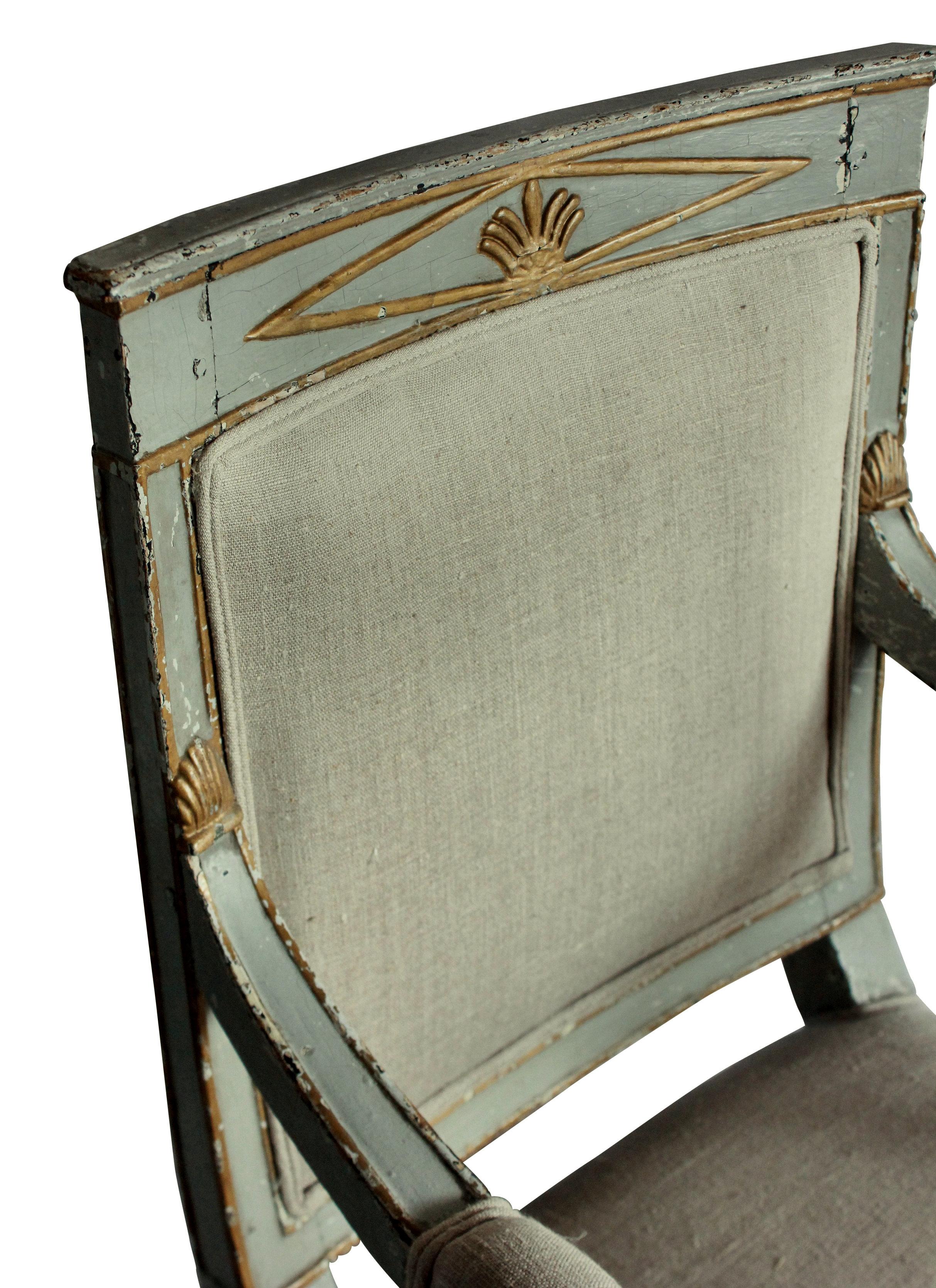 An early 19th century Swedish desk chair with original paints in a duck egg grey. Upholstered in linen and horse hair.