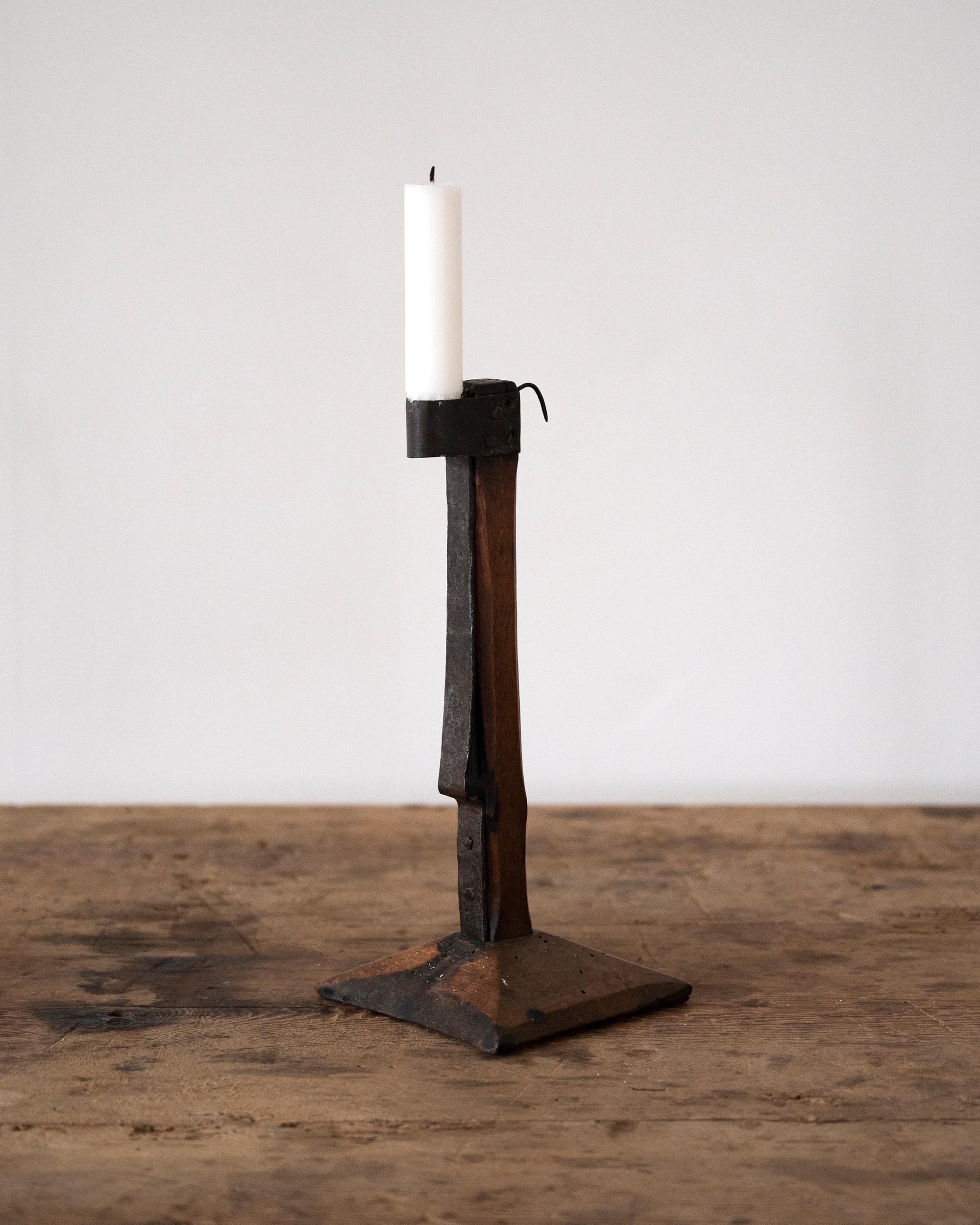 Unusual early 19th century Swedish Folk Art candle holder in pine and iron. Ca 1820 Sweden. 
