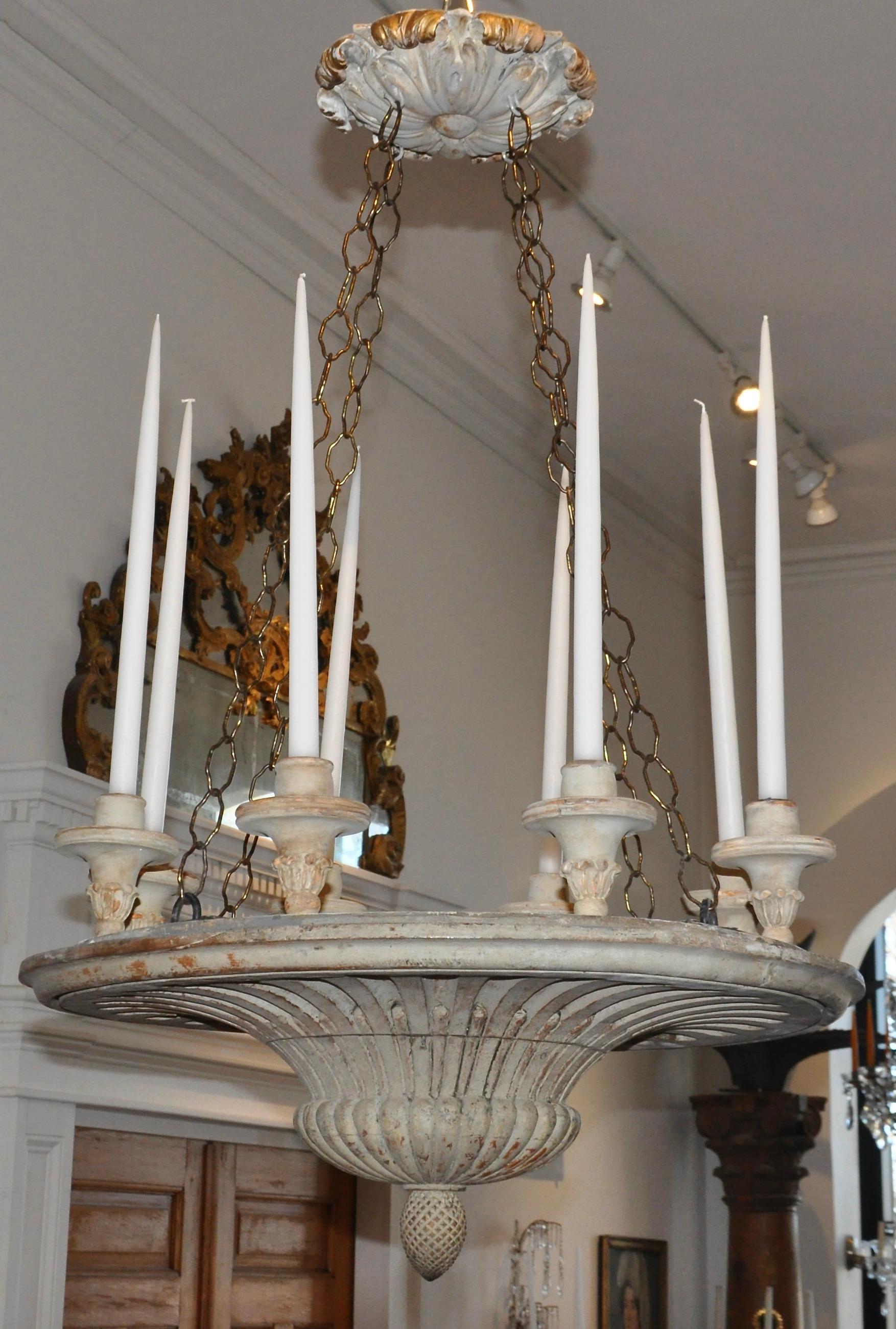 Period early 19th century Swedish painted wooden 8 light chandelier. Neoclassical bowl with 8 carved candle holders. Mostly retains original paint and color. Some minor refreshing. Great Patina. Rare and chic form
