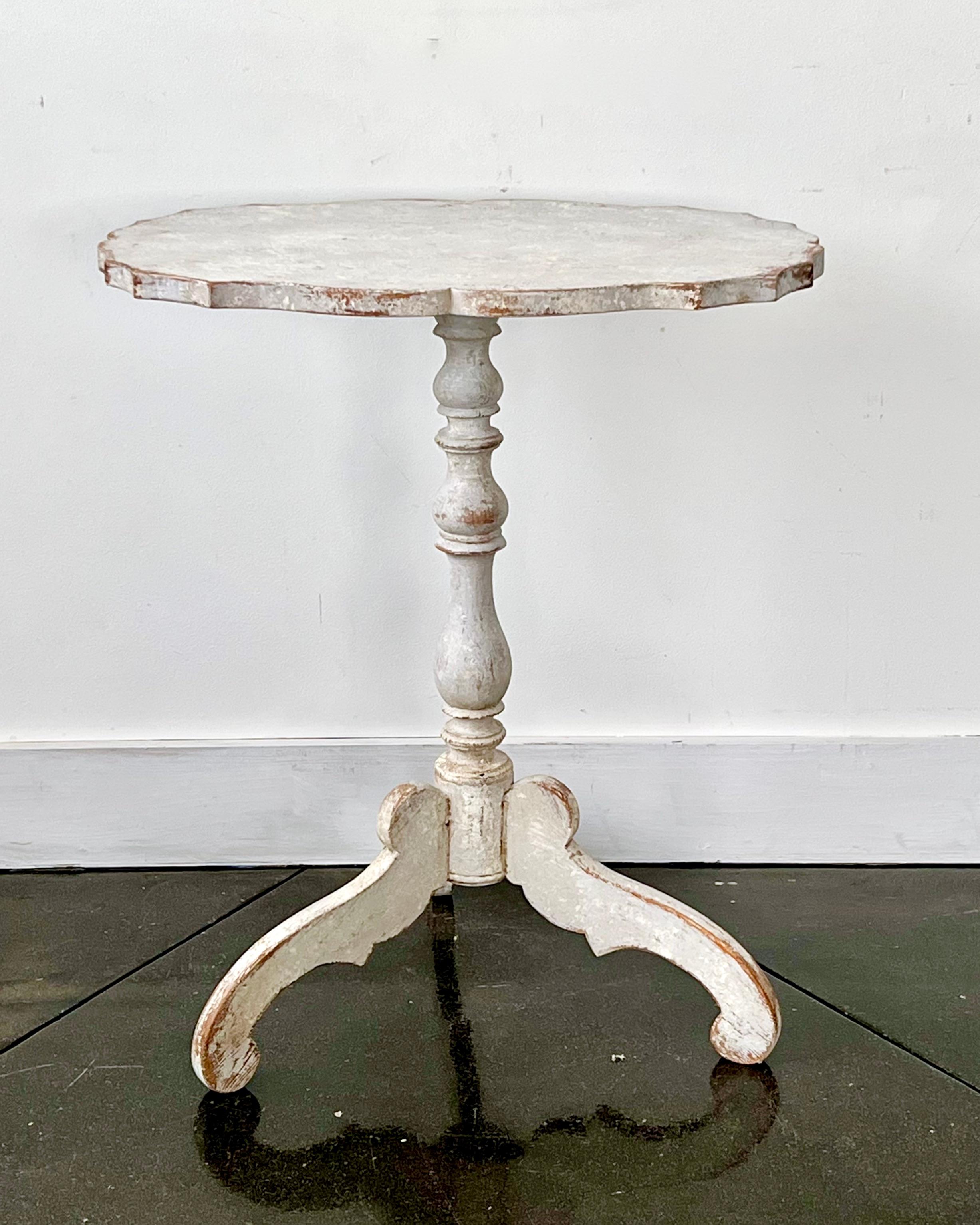 Early 19th century painted, shaped top pedestal table with turned base supported by beautifully carved legs. Scraped pack to traces of its original paint and touch up.
Värmland, Sweden, circa 1830.
Here are few example surprising pieces and objects,