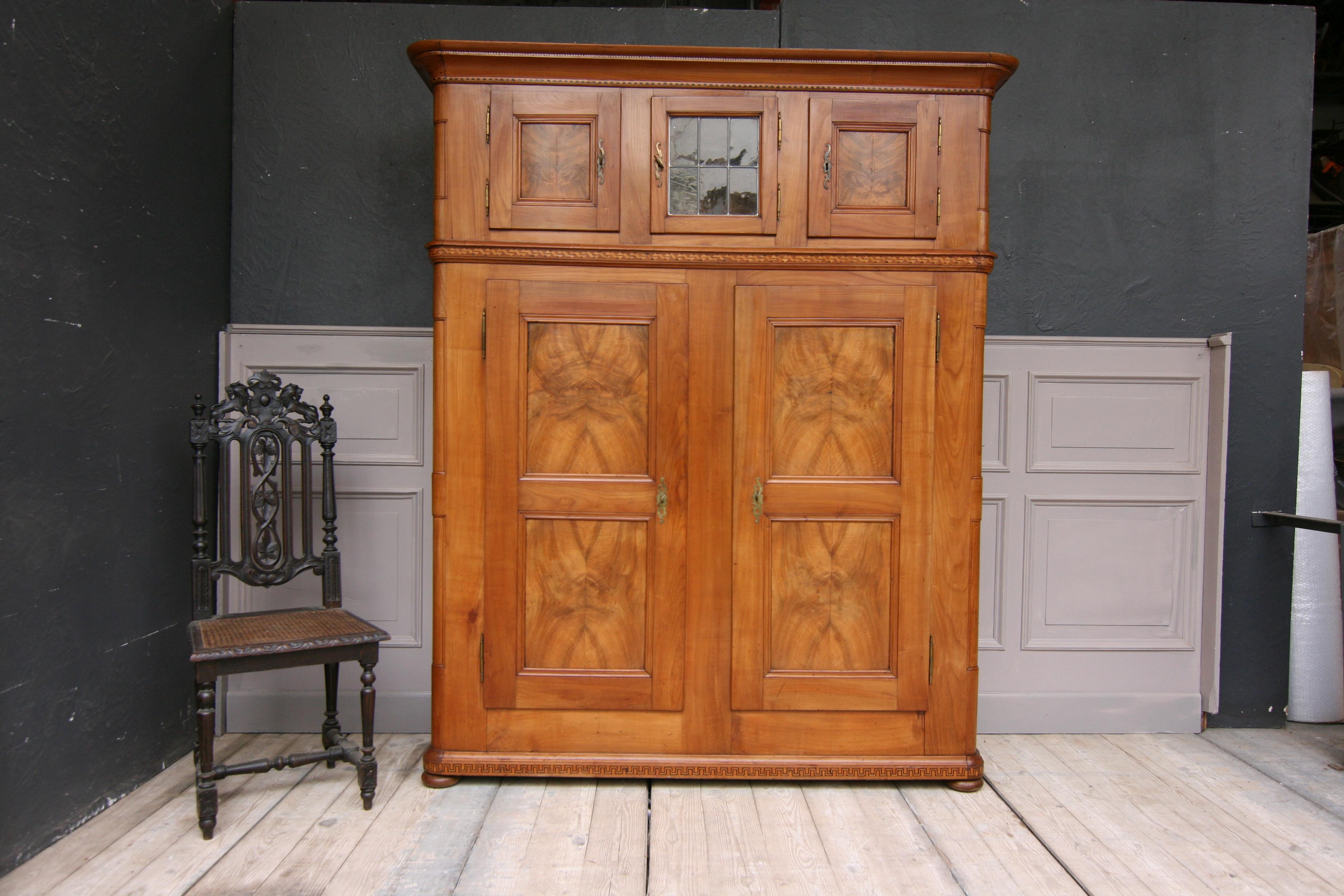 Early 19th Century Swiss Cupboard made of Cherry Wood with Marquetry (Biedermeier)