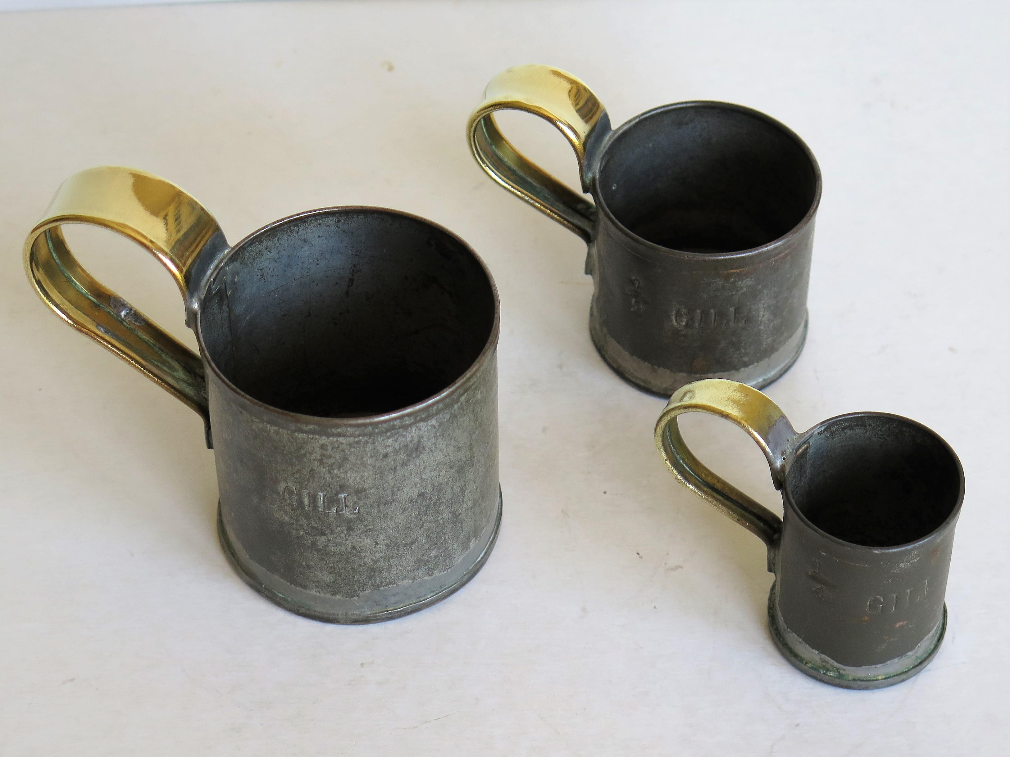 English Early 19th Century Three Graduated Gill Measuring Cups Tin with Brass Handles