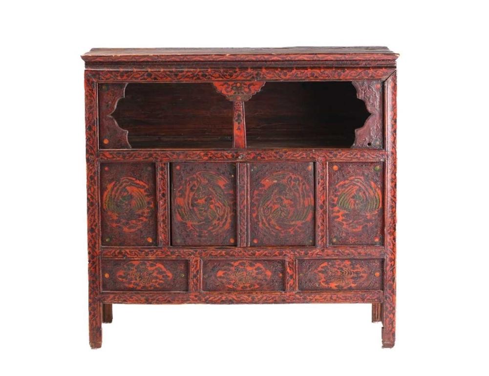 A genuine Tibetan cabinet dating from the late 18th to early 19th century, still retaining its original hand painted panels. 
Original Tibetan cabinets are now extremely rare to find in this condition. 
Tibetan altar cabinets were originally used as