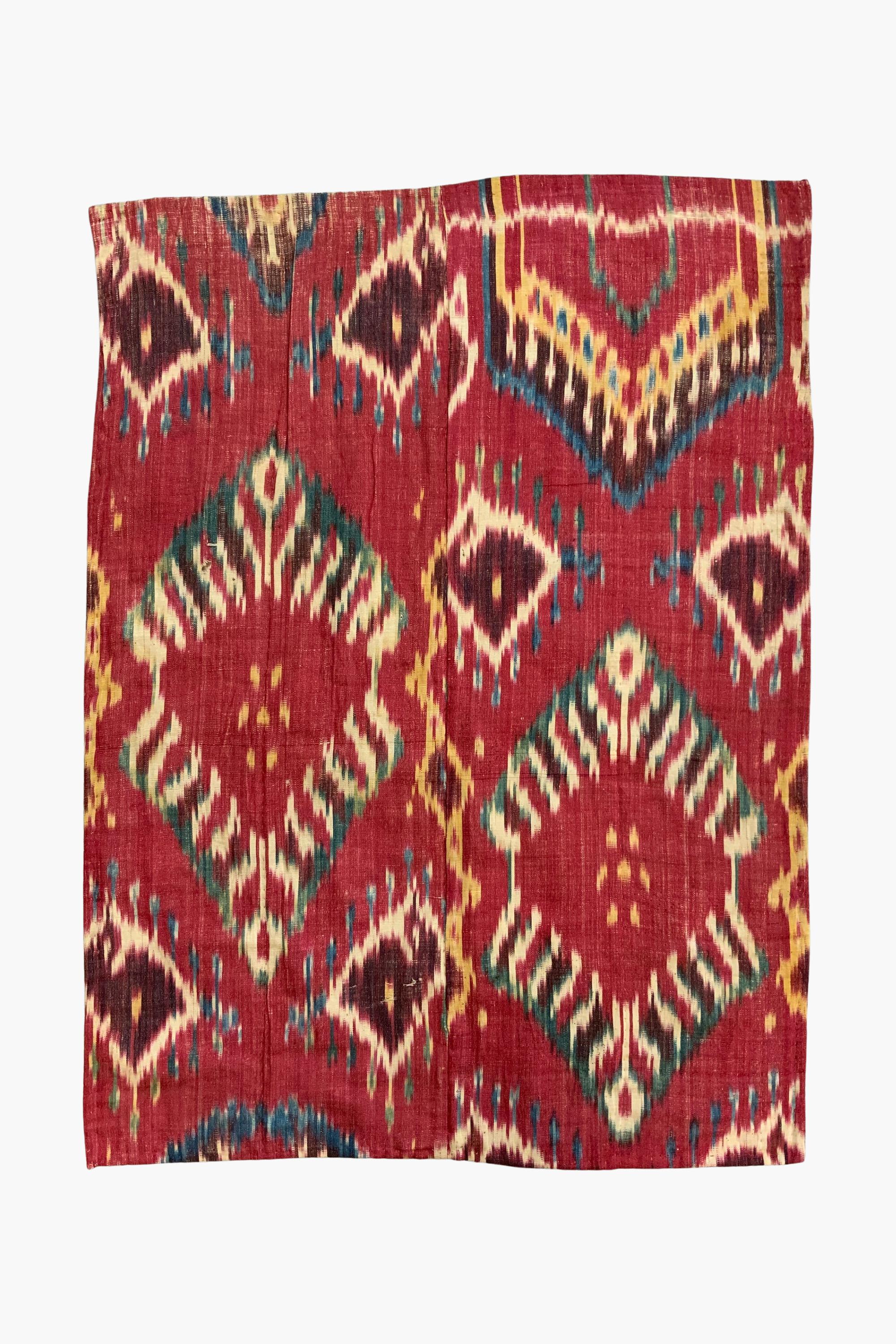 A fragment of the very best Bukhara quality ikat - fully saturated colour with 6 or 7 colours. Probably from a wall hanging.

For references see:
c.f. Goldman collection plates 17, 38, 39
c.f. Colours of the Oassi (Megali collection) plate 92